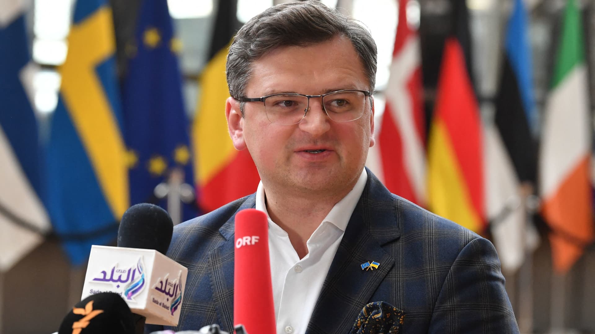Ukrainian Foreign Minister Dmytro Kuleba answers journalists during a Foreign Affairs Council meeting at the EU headquarters in Brussels on May 16, 2022.