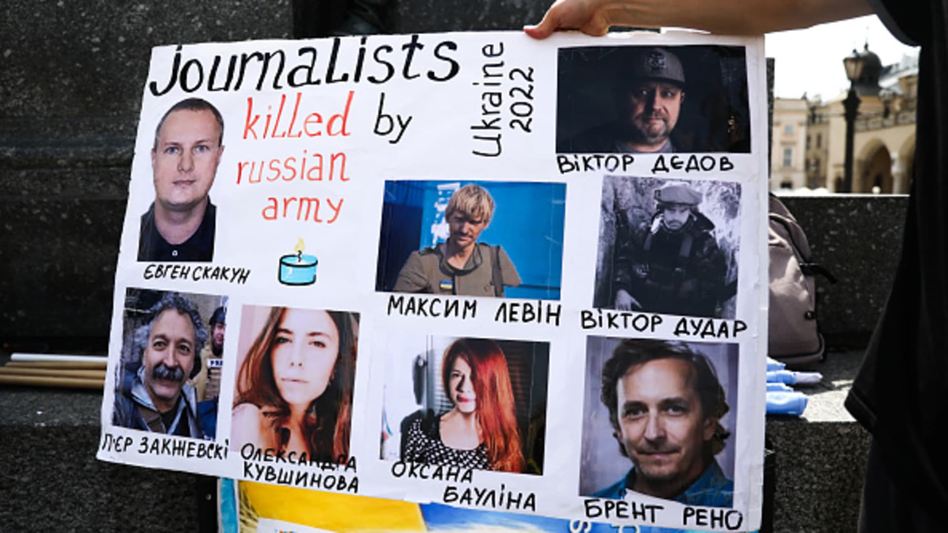 A poster with journalists killed during the Russian invasion on Ukraine is seen on the demonstration in Krakow, Poland on May 16, 2022.