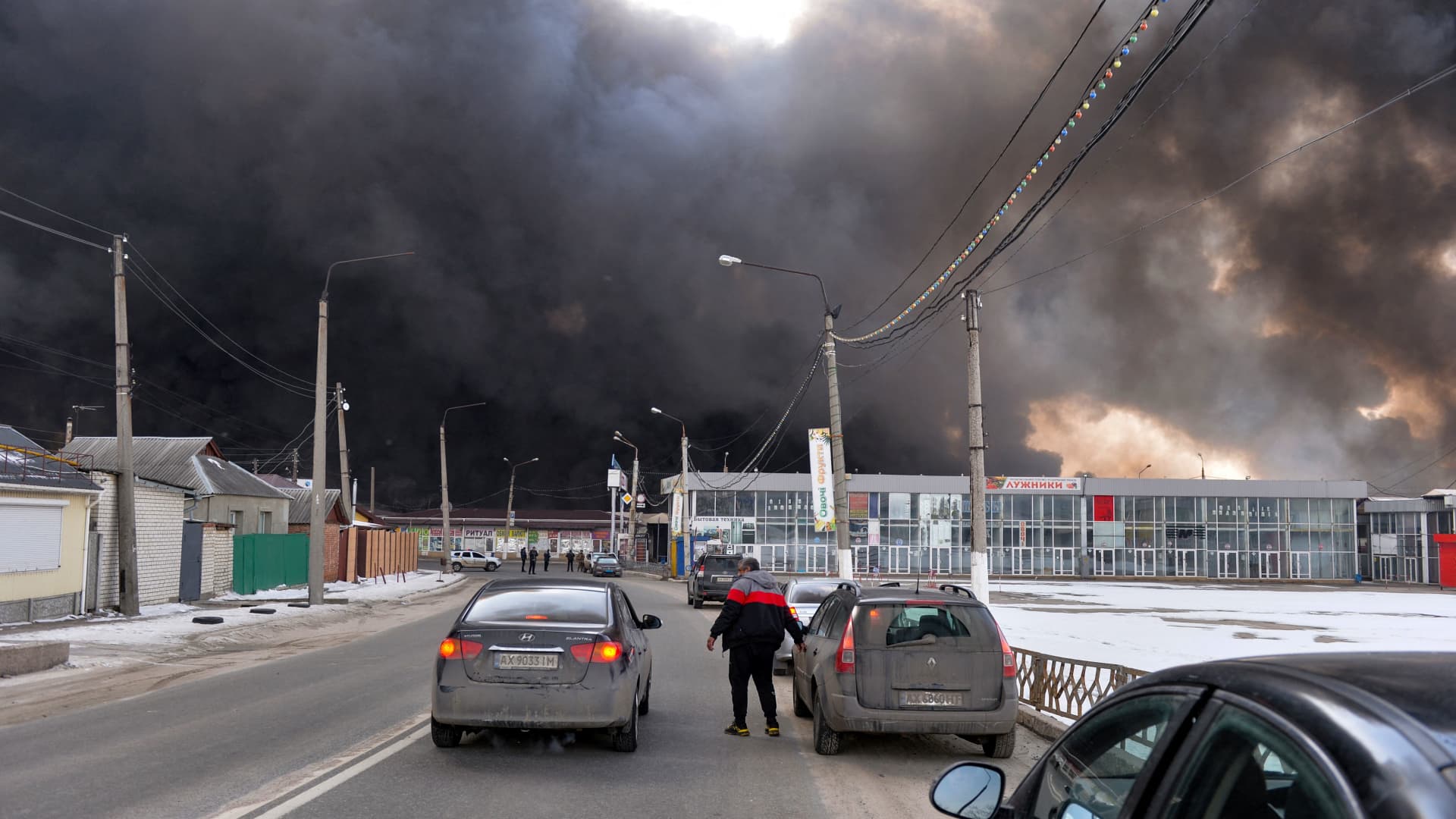 Black smoke rises into the sky from the Barabashovo market - one of the largest markets in the eastern Europe covering an area of more than 75 hectares - which was reportedly hit by shelling, in Kharkiv on March 17, 2022, amid the ongoing Russia's invasion of Ukraine.
