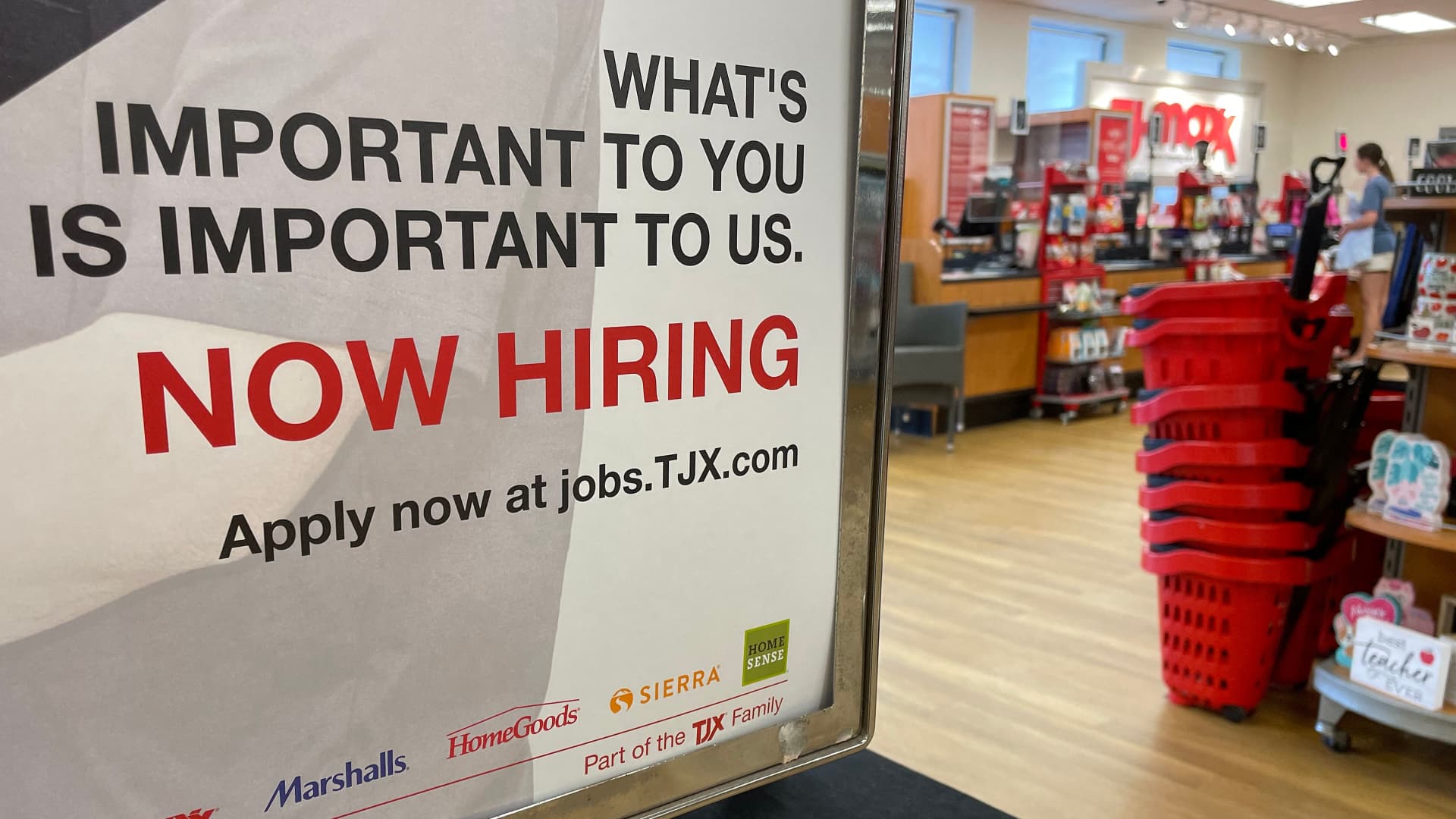 A Now Hiring sign at T.J. Maxx in Annapolis, Maryland, on May 16, 2022.