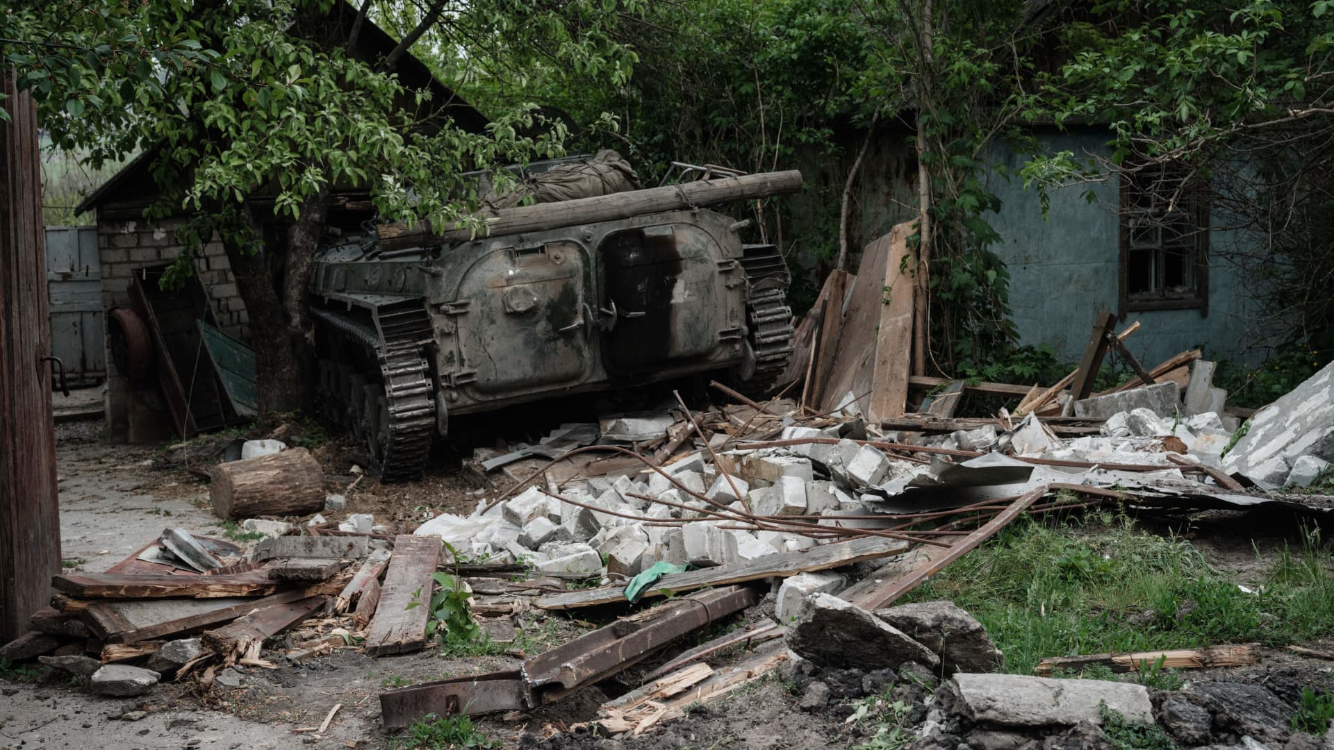 The remains of a military vehicle is seen following the shelling of the village of Bilogorivka, Lugansk region, eastern Ukraine, pictured on May 13, 2022.
