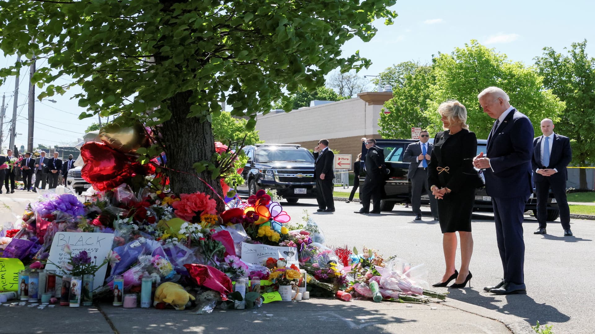 U.S. President Joe Biden and first lady Jill Biden pay their respects to the 10 people killed in a mass shooting by a gunman authorities say was motivated by racism, at the TOPS Friendly Markets memorial site in Buffalo, NY, U.S. May 17, 2022. 