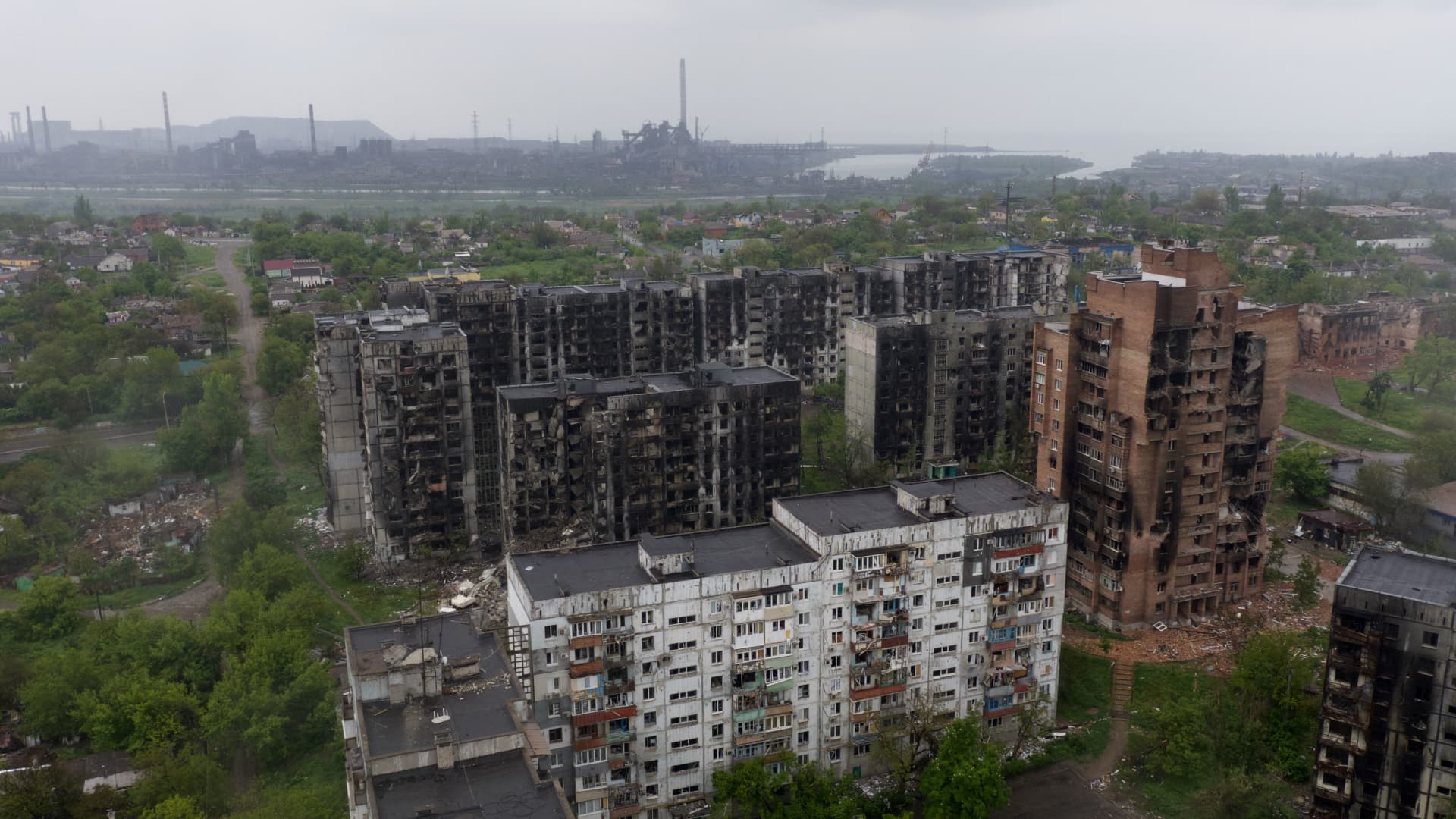 An aerial view of damaged residential buildings and the Azovstal steel plant in the port city of Mariupol on May 18, 2022.