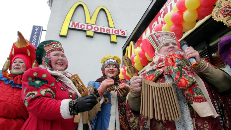 Traditionally dressed Russian musicians perform in front of the then-busiest McDonald's restaurant in the world in Pushkin Square in Moscow during the 15th anniversary of the opening of its first restaurant in Russia on January 31, 2005.