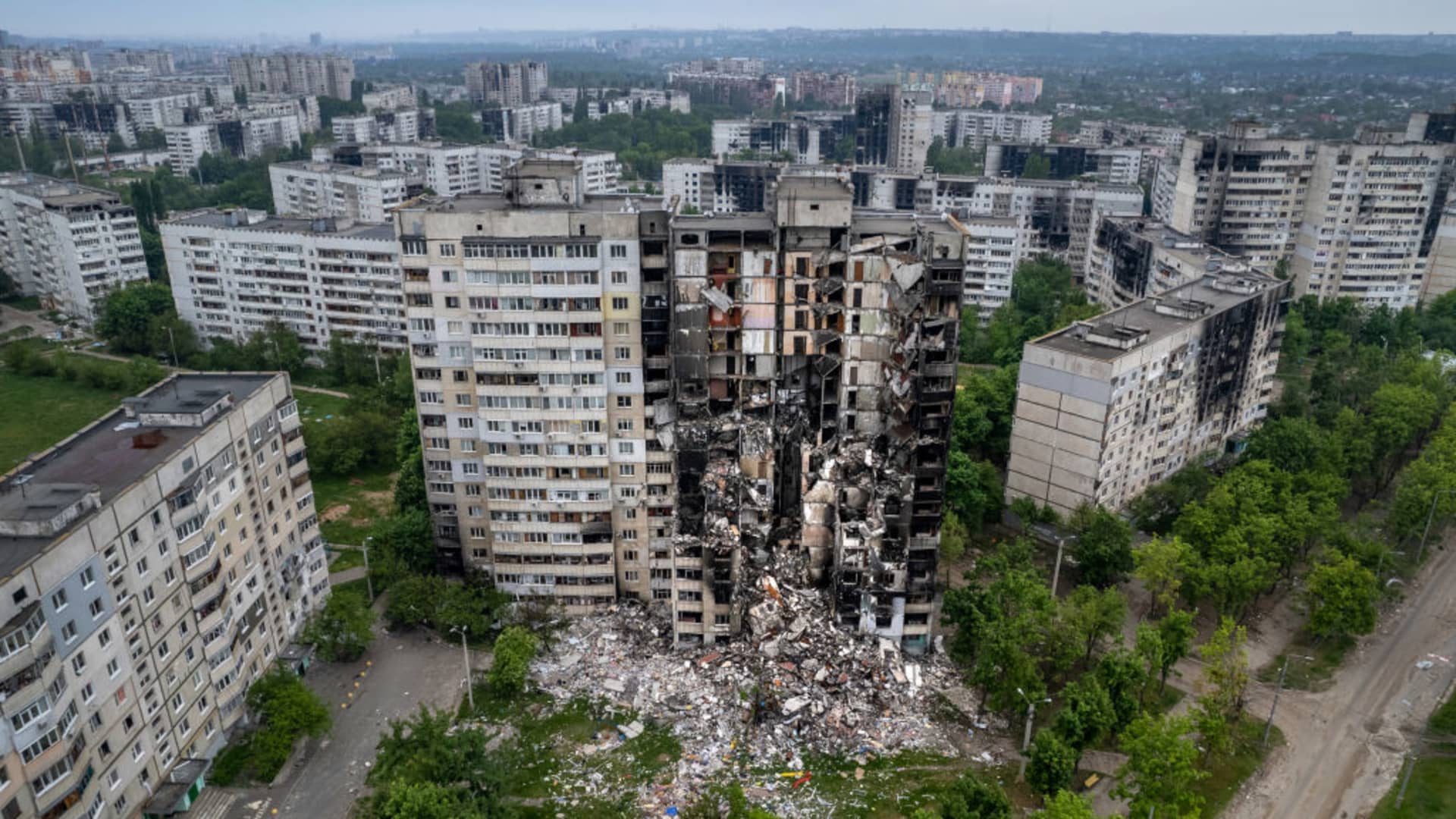 In an aerial view, uninhabitable apartment buildings stand in a former frontline neighborhood on May 21, 2022 in Kharkiv, Ukraine.
