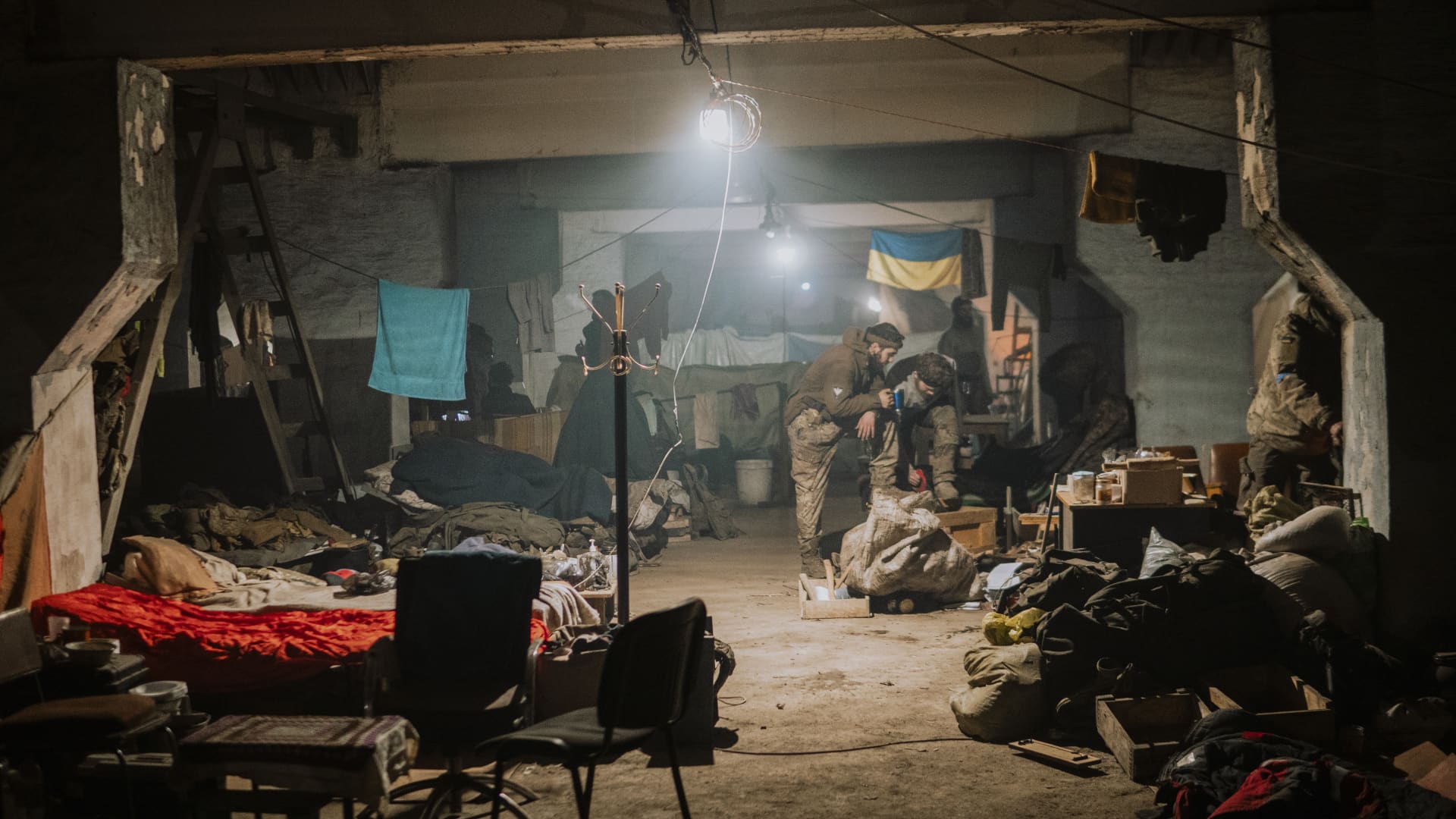 Ukrainian soldiers inside the ruined Azovstal steel plant in their shelter in Mariupol, Ukraine, May 7, 2022. For nearly three months, Azovstal's garrison clung on, refusing to be winkled out from the tunnels and bunkers under the ruins of the labyrinthine mill. 