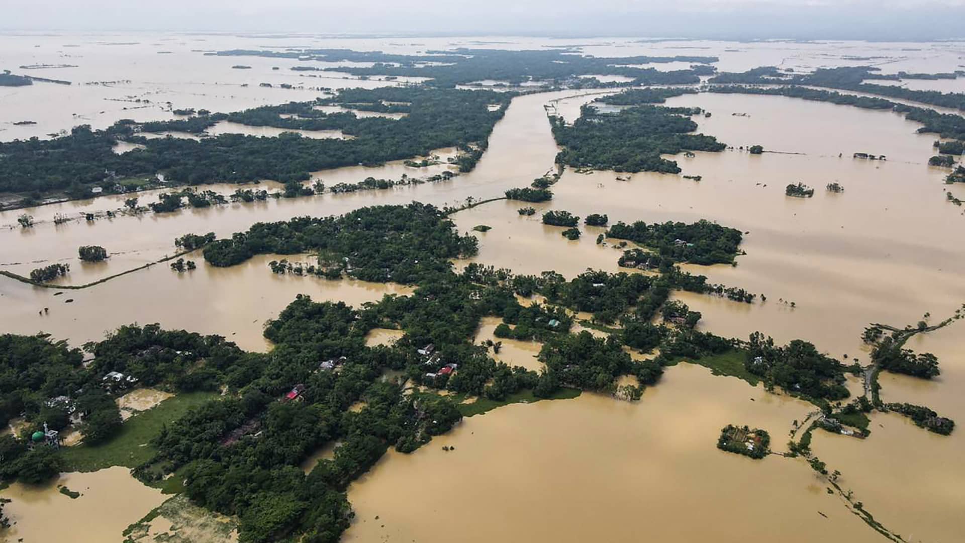 This aerial photograph shows houses inundated following heavy rains in Beanibazar, Bangladesh on May 21, 2022.