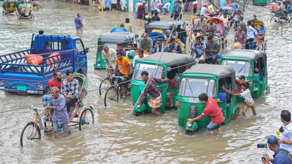 Vehicles stuck in the floodwater in Sylhet, Bangladesh, May 17, 2022. Many roads have been submerged due to continuous high rains for several days.