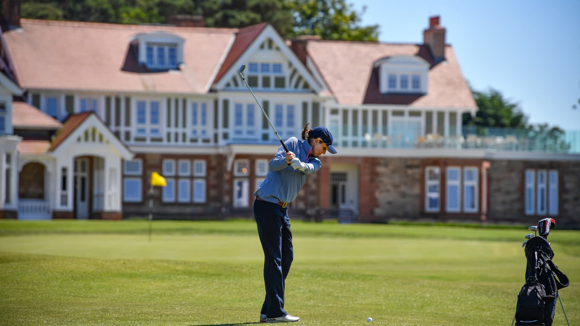 A woman plays golf at Muirfield, Scotland, in 2019, as the club opened its doors to women for the first time. It will host the Women's Open Championship in August.