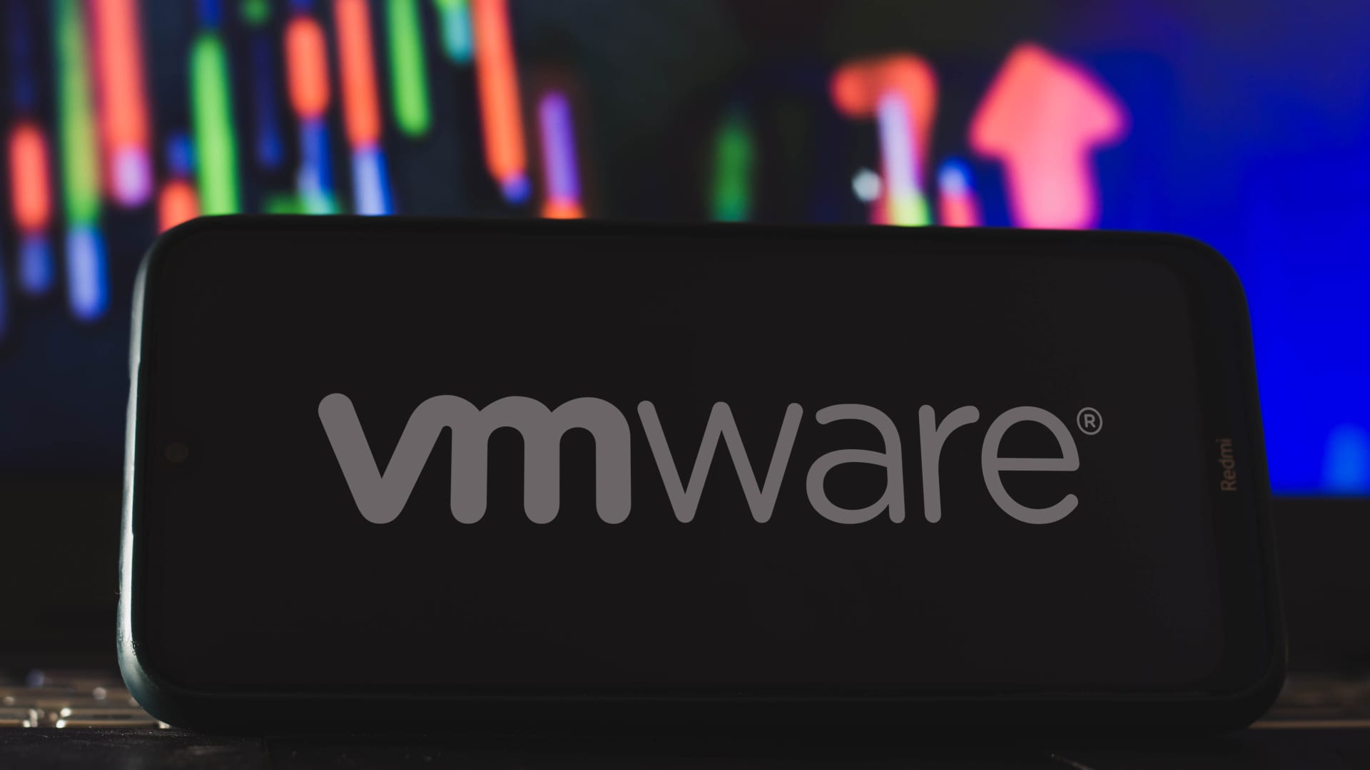 In this photo illustration VMware logo is displayed on a smartphone screen.
