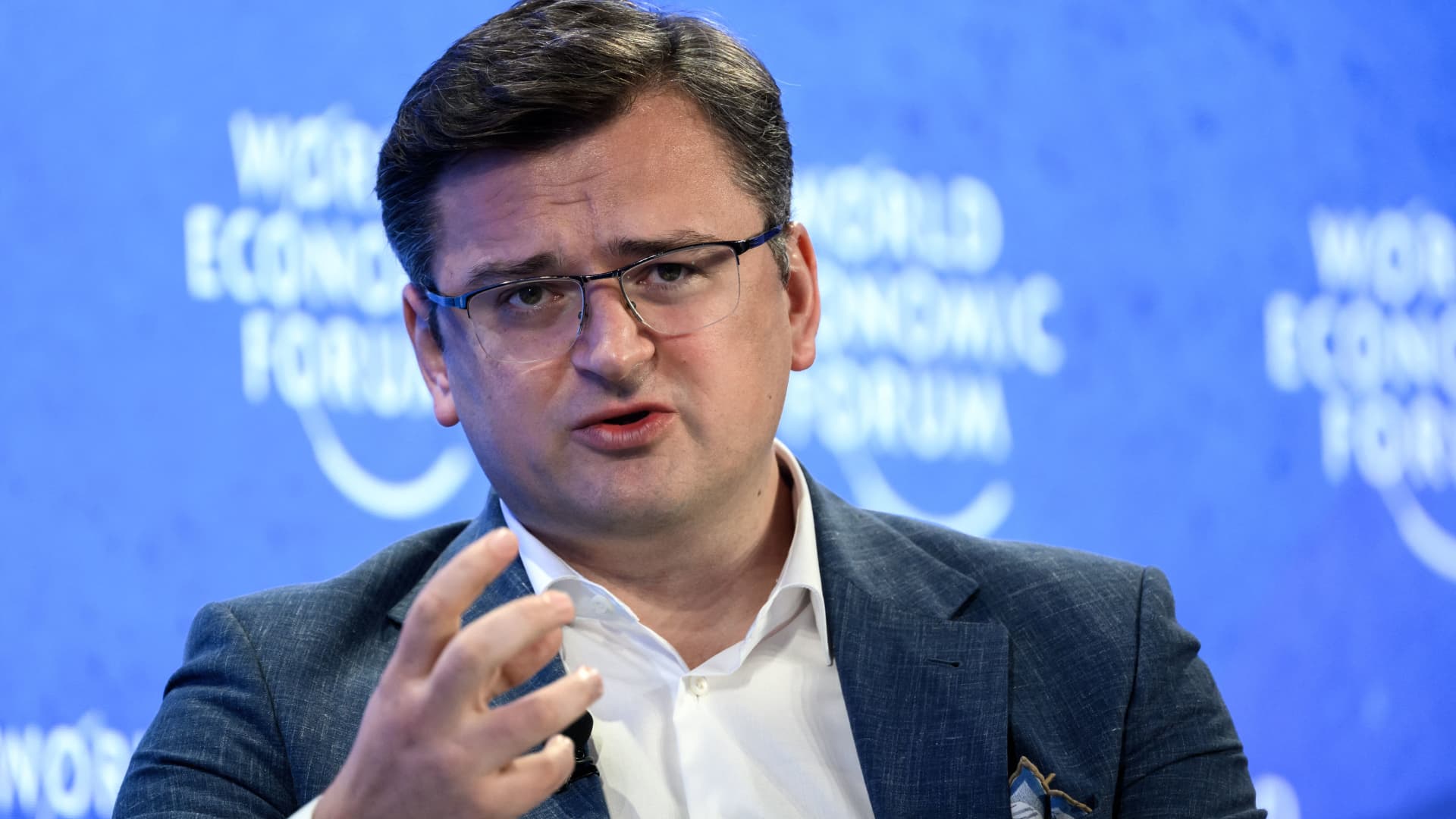 Ukrainian Foreign Minister Dmytro Kuleba gestures during a session at the World Economic Forum (WEF) annual meeting in Davos, on May 25, 2022.