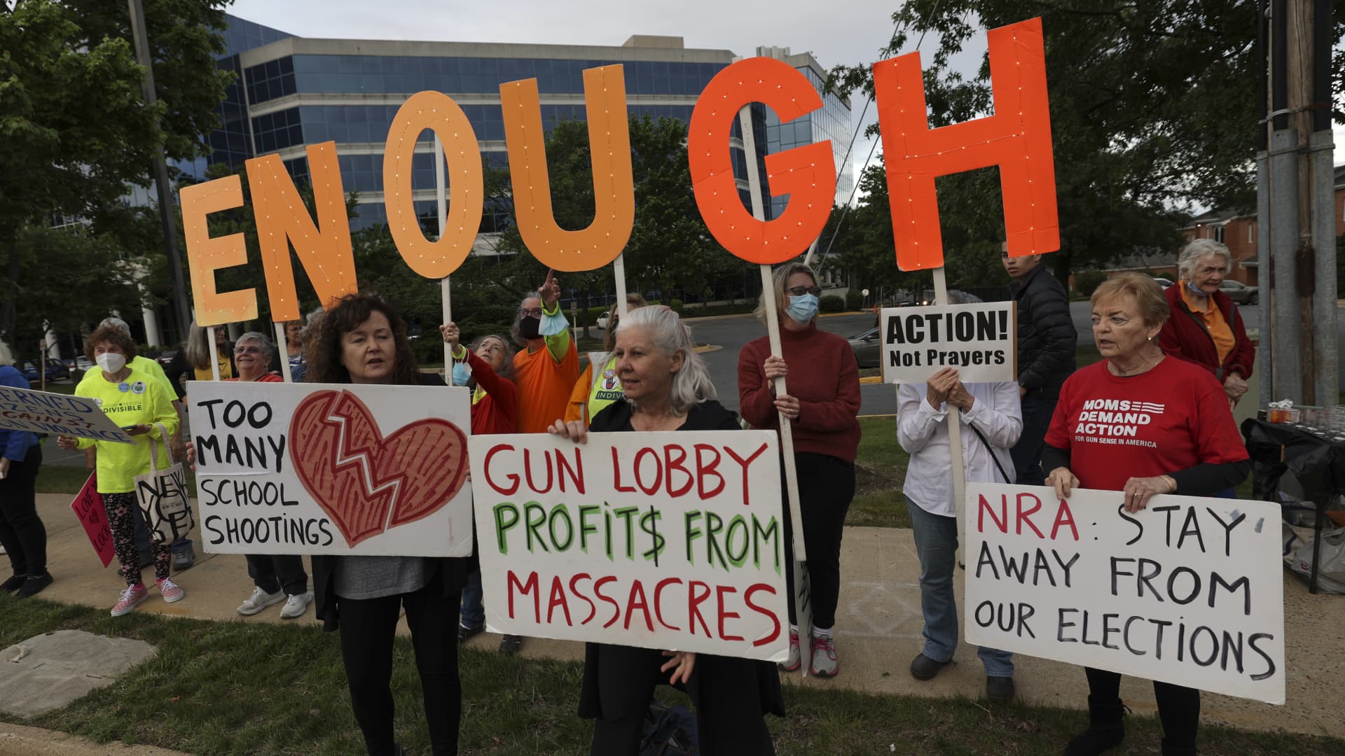 Gun-control advocates hold a vigil outside of the National Rifle Association (NRA) headquarters following the recent mass shooting at Robb Elementary School on May 25, 2022 in Fairfax, Virginia.