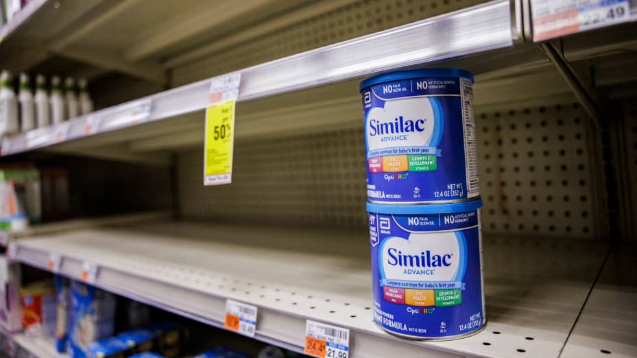 Shelves normally meant for baby formula sit nearly empty at a store in downtown Washington, DC, on May 22, 2022.