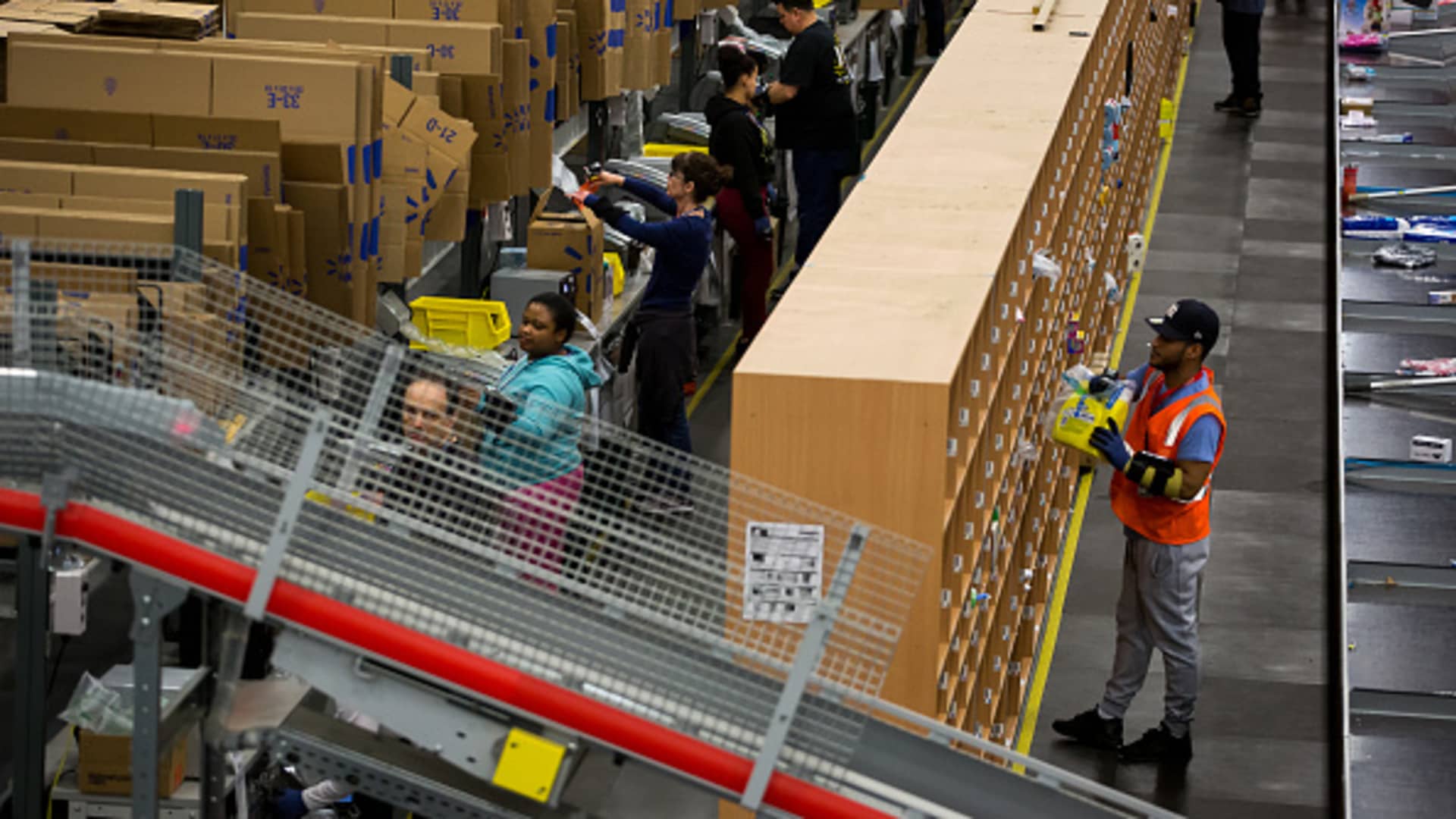 A package moves along a conveyor belt inside a Wal-Mart Stores Inc. fulfillment center in Bethlehem, Pennsylvania.