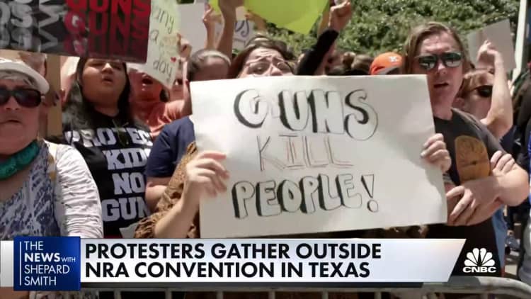Protesters gather outside NRA event where Trump and Cruz spoke