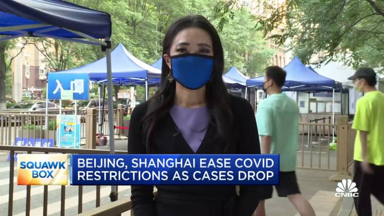 Beijing, Shanghai relax Covid restrictions as cases decline