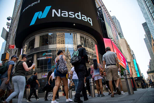 5 Club stocks that did worse than the Nasdaq since year-ago record but are well-liked by analysts