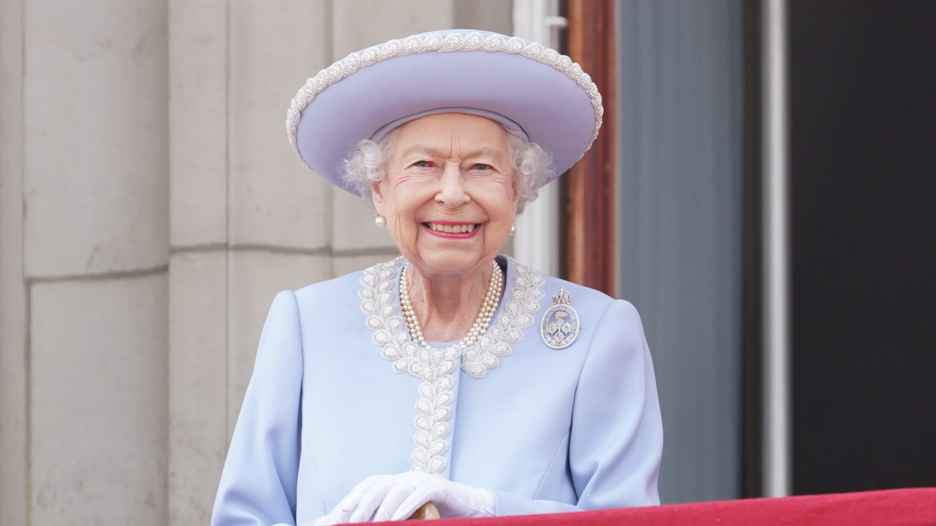 Queen Elizabeth II watches from the balcony of Buckingham Palace during the Trooping the Colour parade the Trooping the Colour parade on June 2, 2022 in London, England.