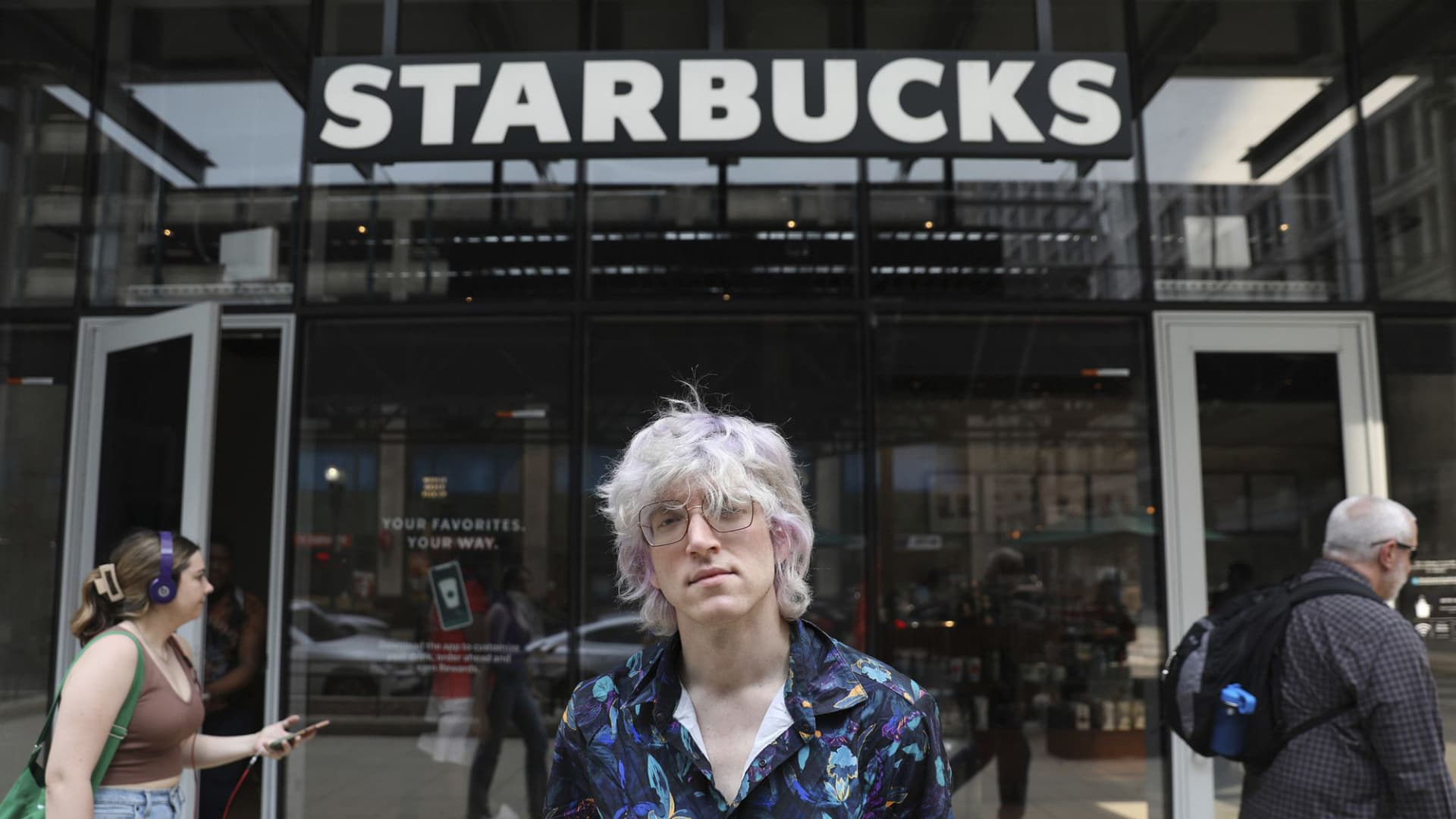 Starbucks barista Brick Zurek, standing in front of the downtown Starbucks on Wabash Avenue, on May 11, 2022, has been organizing for union representation with Starbucks Workers United. The Wabash Avenue location was the first Starbucks in Chicago to file for union representation with the National Labor Relations Board. (Chris Sweda/Chicago Tribune/Tribune News Service via Getty Images)