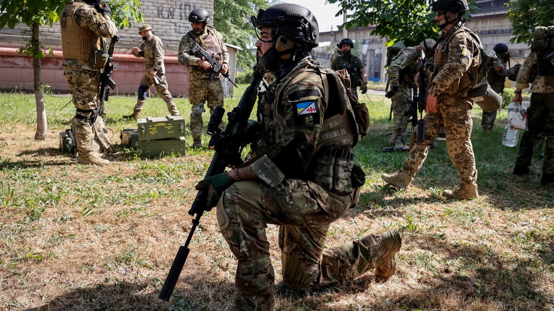 Members of a foreign volunteers unit which fights in the Ukrainian army take positions, as Russia's attack on Ukraine continues, in Sievierodonetsk, Luhansk region Ukraine June 2, 2022.