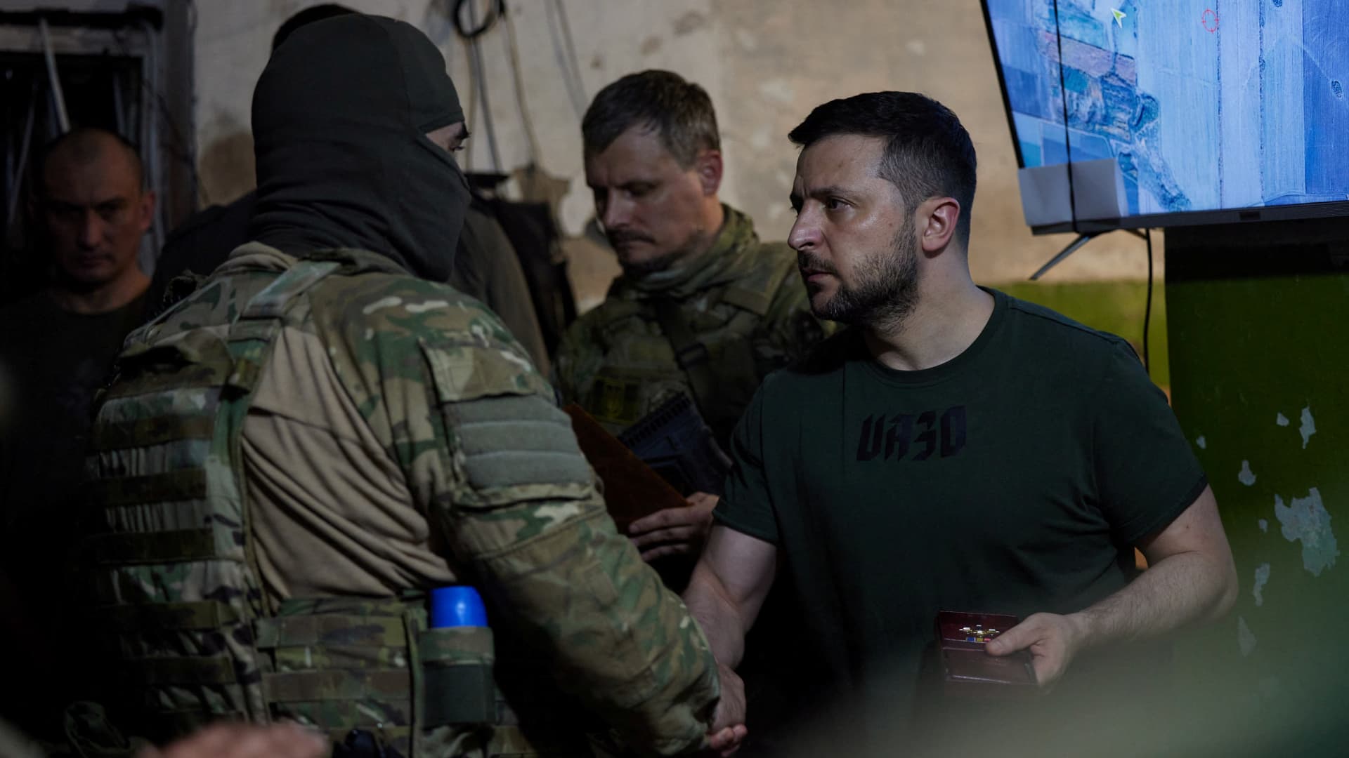 Ukraine's President Volodymyr Zelenskyy awards a soldier as he visits a position of Ukrainian service members, while Russia's attack on Ukraine continues, in Lysychansk, Luhansk region, Ukraine June 5, 2022.
