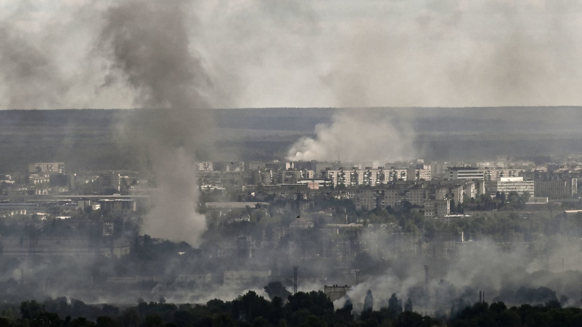 Smoke and dirt rise from shelling in the city of Severodonetsk during fight between Ukrainian and Russian troops in the eastern Ukrainian region of Donbas on June 7, 2022.