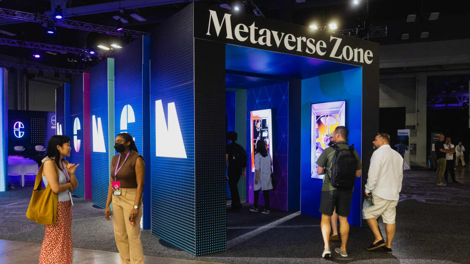 Attendees walk through a Metaverse Zone exhibit during the CoinDesk 2022 Consensus Festival in Austin, Texas, US, on Friday, June 10, 2022.