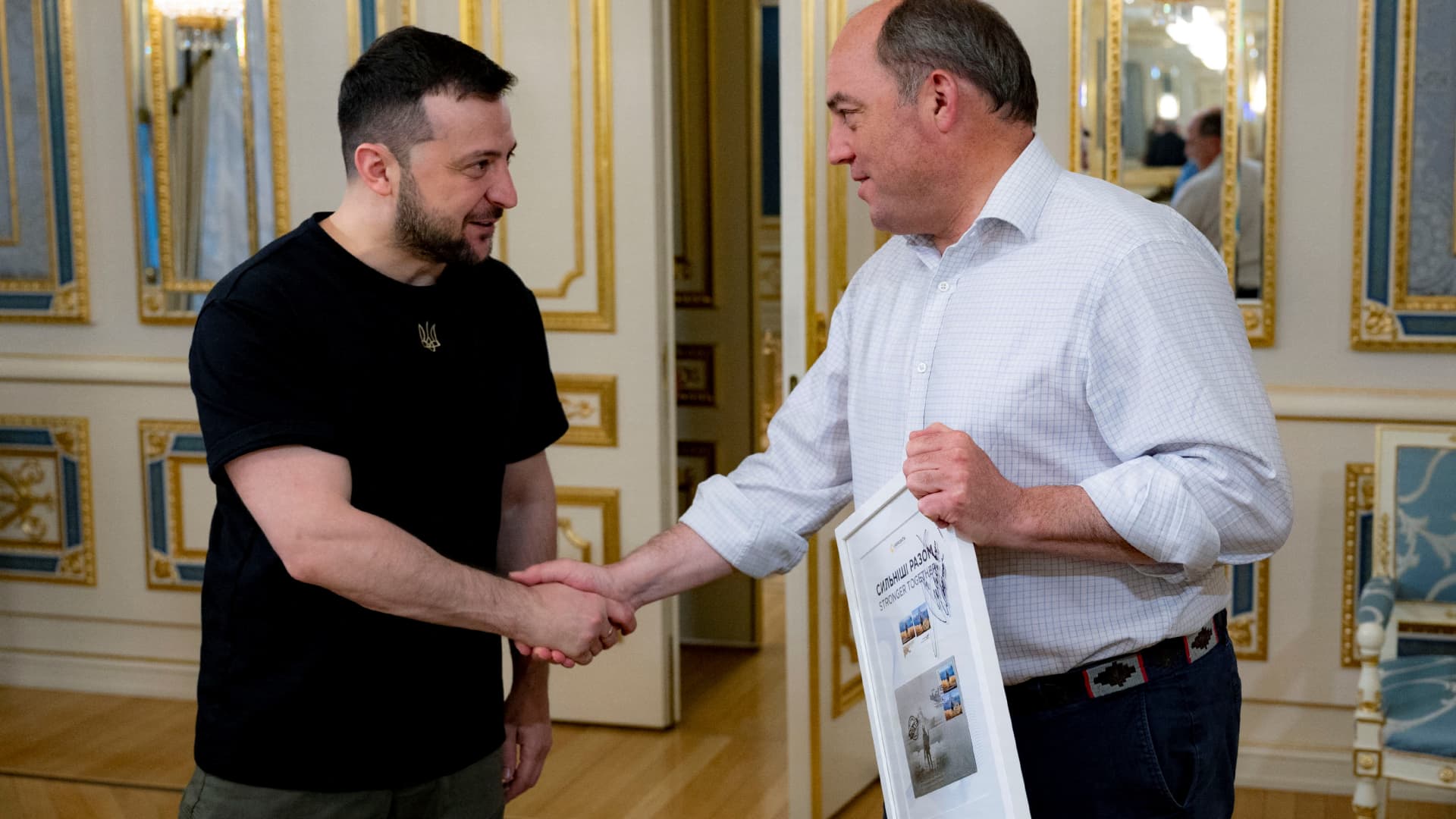British Defence Secretary Ben Wallace and Ukraine's President Volodymyr Zelenskiy shake hands after a meeting, as Russia's attack on Ukraine continues, in Kyiv, Ukraine June 10, 2022.