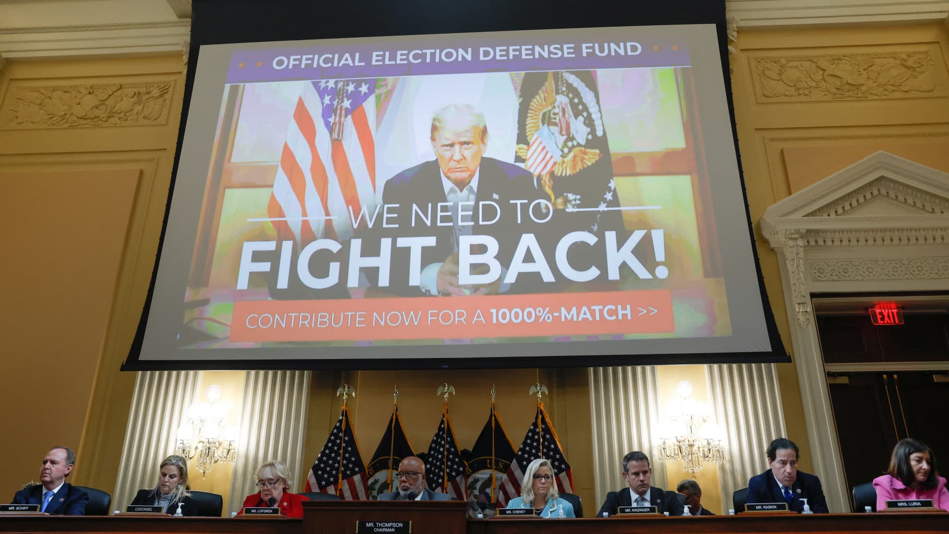 An advertisement soliciting donations for former U.S. President Donald Trump is seen as it was introduced as evidence and displayed on a screen above U.S. Representative Zoe Lofgren (D-CA), Chairperson Bennie Thompson (D-MS) , Vice Chair U.S. Representative Liz Cheney (R-WY) and U.S. Representative Adam Kinzinger (R-IL) holding the second public hearing of the U.S. House Select Committee to Investigate the January 6 Attack on the United States Capitol, at Capitol Hill, in Washington, U.S. June 13, 2022.