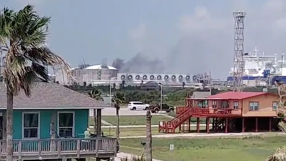 Smoke billows from the Freeport LNG plant in Quintana, Texas, U.S., June 8, 2022, in this still image obtained from a social media video on June 9, 2022.  Courtesy of Maribel Hill/via REUTERS    THIS IMAGE HAS BEEN SUPPLIED BY A THIRD PARTY. MANDATORY CREDIT. NO RESALES. NO ARCHIVES