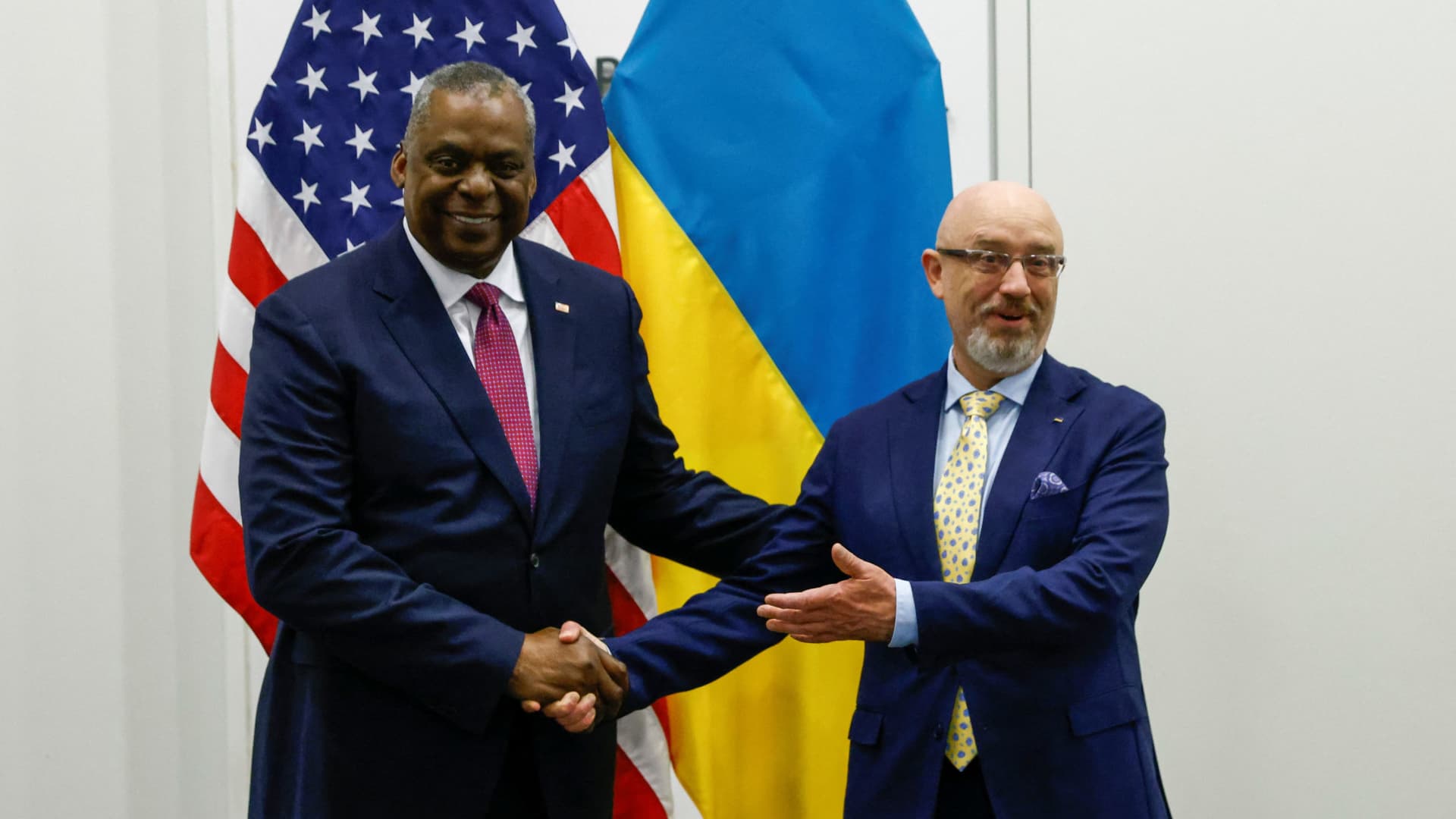 U.S. Defense Secretary Lloyd Austin shakes hands with Ukraine's Defence Minister Oleksii Reznikov ahead of a NATO defence ministers' meeting at the alliance's headquarters in Brussels, Belgium June 15, 2022. 