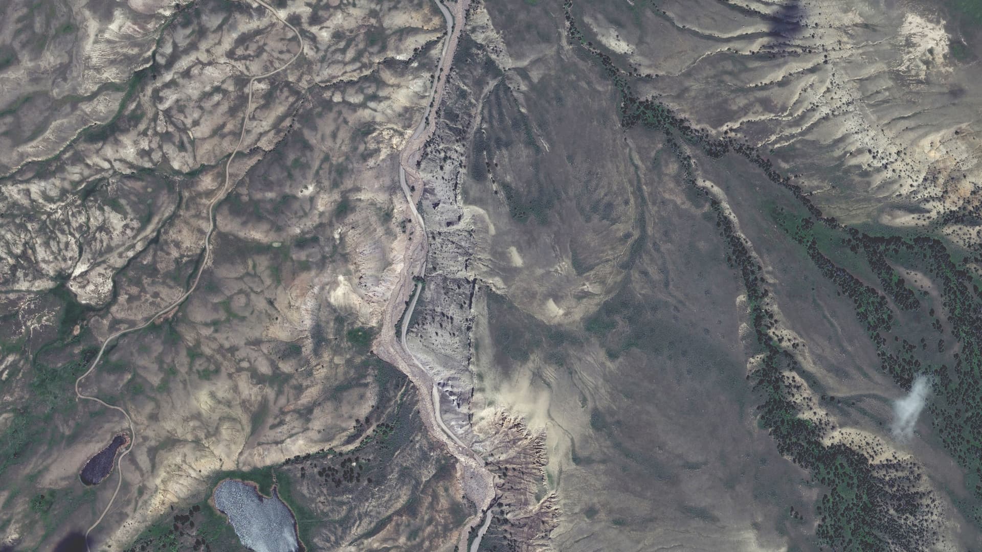 A satellite image shows an overview of multiple road washouts towards the entrance to Yellowstone National Park north entrance, Montana, U.S. June 15, 2022. Picture taken June 15, 2022. 