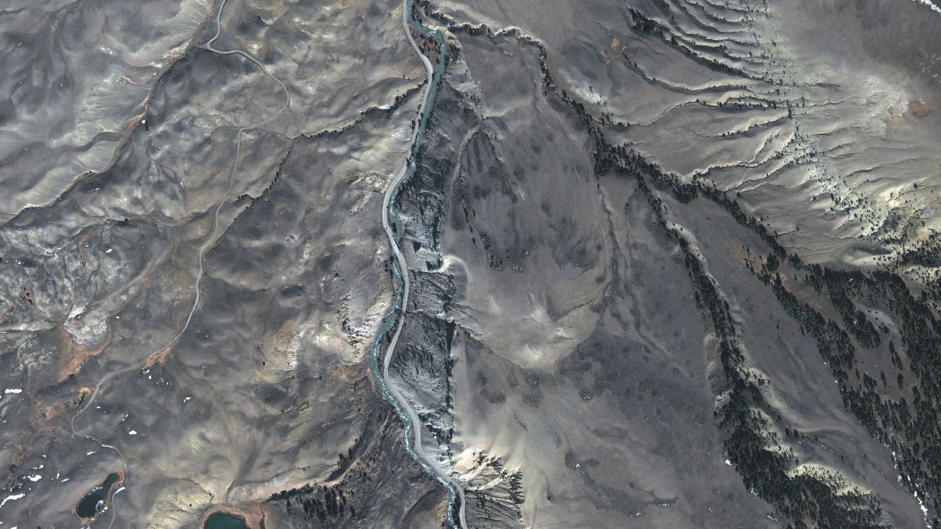 A satellite image shows an overview of a road before floods towards the entrance to Yellowstone National Park north entrance, Montana, U.S. March 30 2022 Picture taken March 30 2022. 
