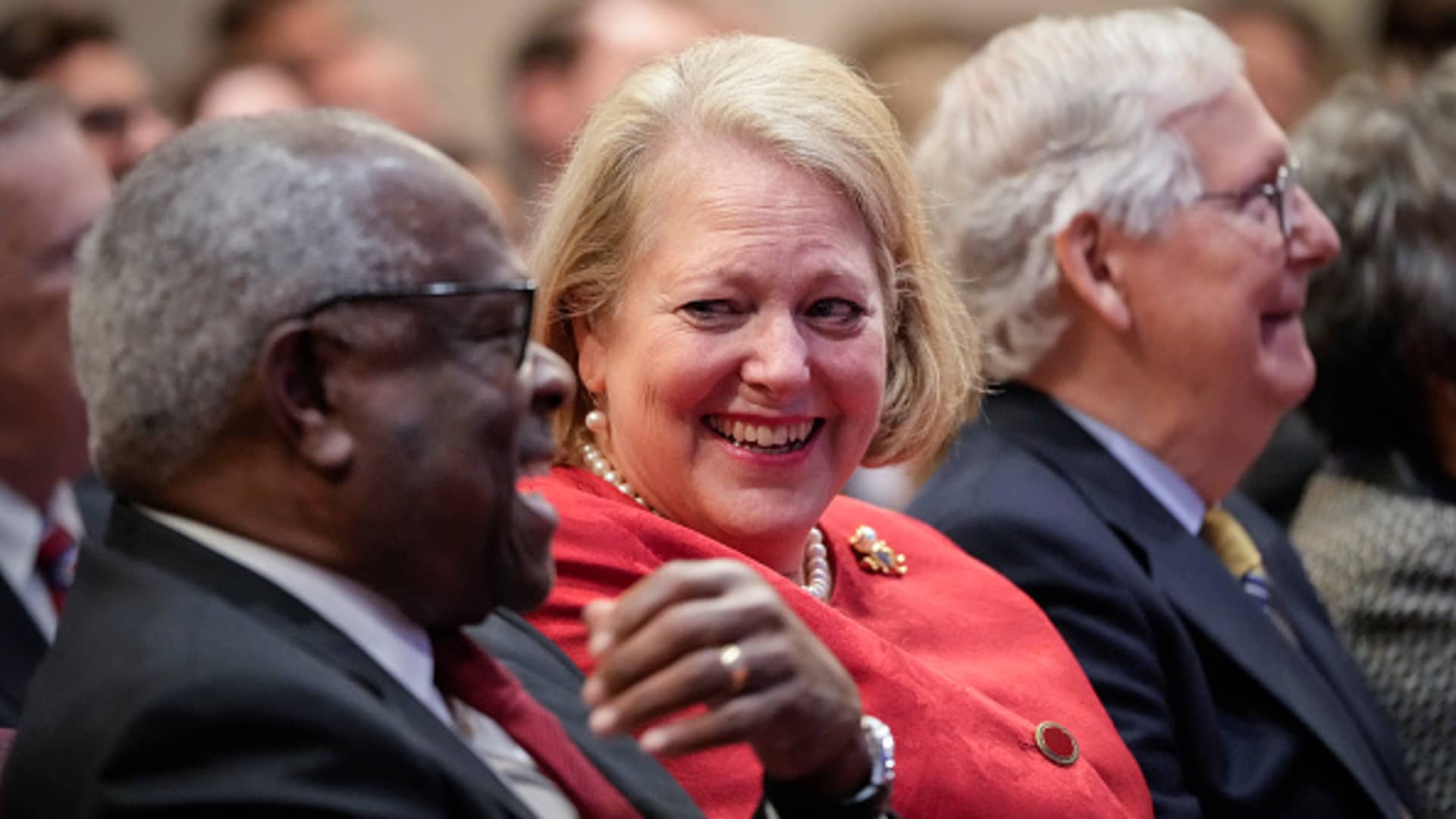 WASHINGTON, DC - OCTOBER 21: (L-R) Associate Supreme Court Justice Clarence Thomas sits with his wife and conservative activist Virginia Thomas while he waits to speak at the Heritage Foundation on October 21, 2021 in Washington, DC.