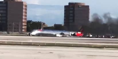 Plane catches fire after landing at Miami airport, 3 injured