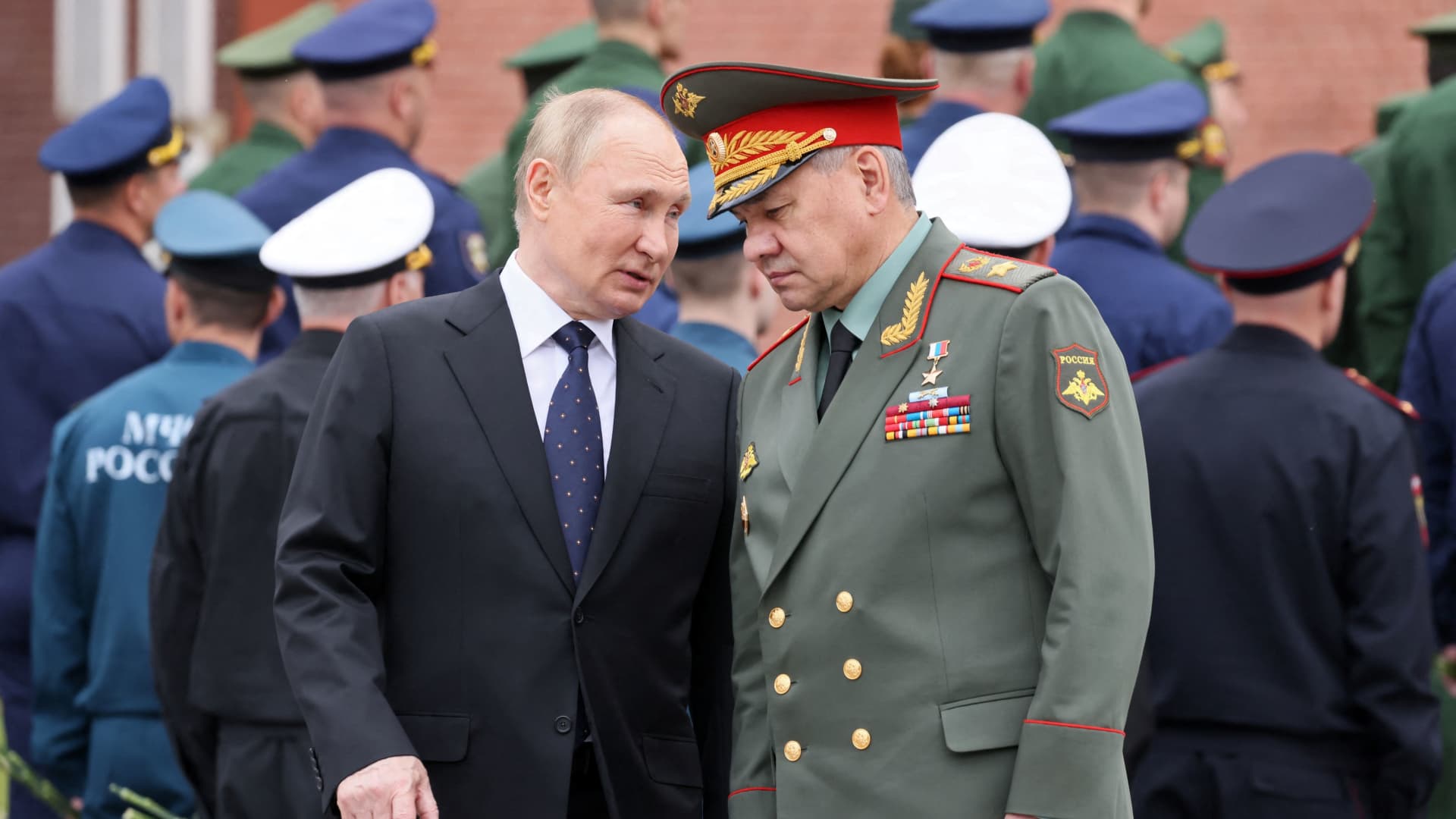 Russian President Vladimir Putin and Defence Minister Sergei Shoigu attend a wreath-laying ceremony, which marks the anniversary of the beginning of the Great Patriotic War against Nazi Germany in 1941, at the Tomb of the Unknown Soldier by the Kremlin wall in Moscow, Russia June 22, 2022. 