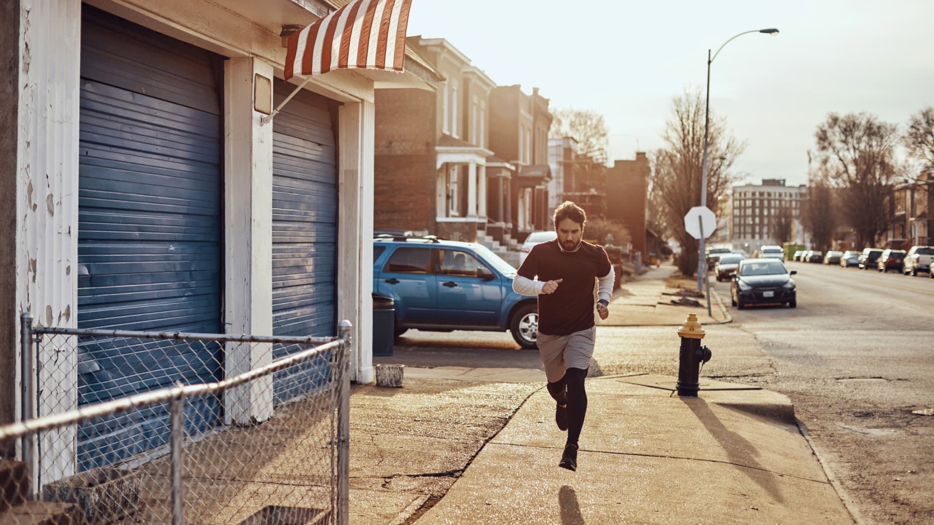 A man runs in St. Louis, MO.