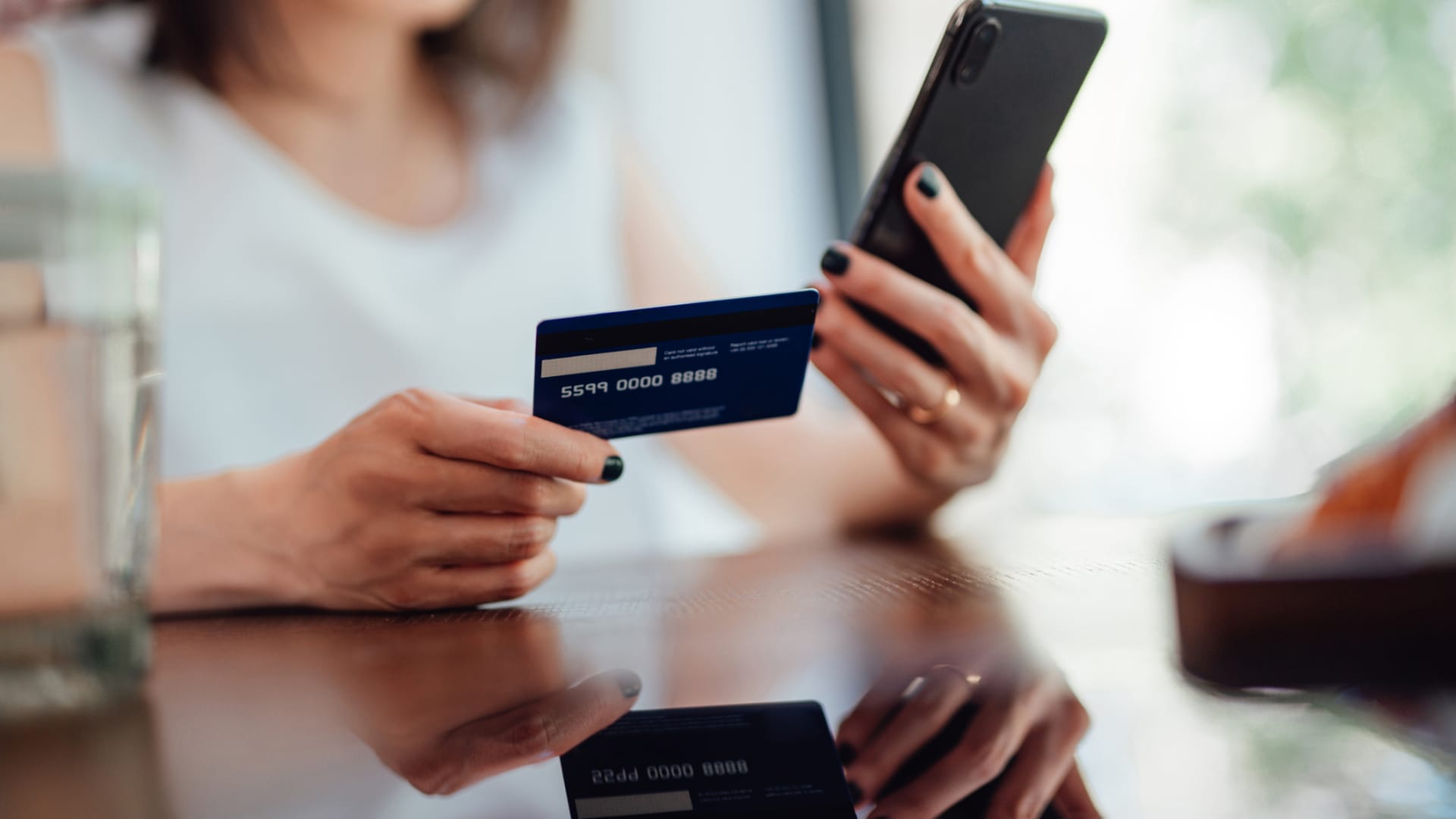 Credit card users paid nearly $164 billion in fees, interest in 2022. It may ‘get a little worse,’ analyst warns