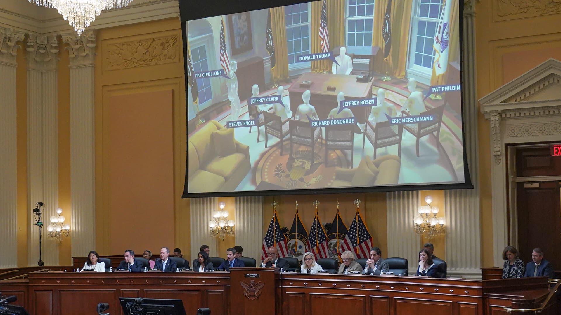 An animated recreation of a meeting between former president Donald Trump, Pat Cipollone, Steven Engel, Jeffery Clark, Richard Donoghue, Jeffery Rosen, Eric Herschmann and Pat Philbin is shown on a screen during the fifth hearing held by the Select Committee to Investigate the January 6th Attack on the U.S. Capitol on June 23, 2022 in the Cannon House Office Building in Washington, DC. The bipartisan committee, which has been gathering evidence related to the January 6, 2021 attack at the U.S. Capitol for almost a year, is presenting its findings in a series of televised hearings. On January 6, 2021, supporters of President Donald Trump attacked the U.S. Capitol Building in an attempt to disrupt a congressional vote to confirm the electoral college win for Joe Biden. (Photo by Demetrius Freeman-Pool/Getty Images)