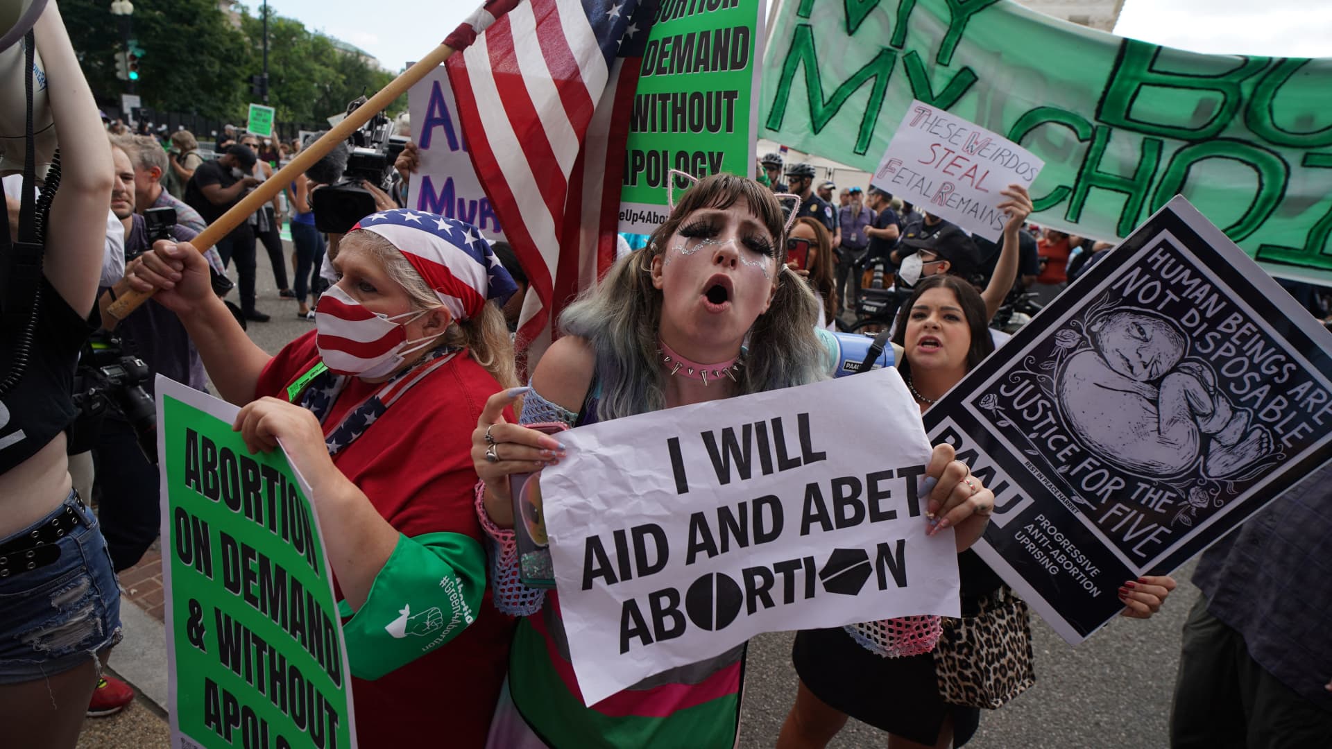 Pro-choice and anti-abortion demonstrators gather outside the US Supreme Court in Washington, DC, on June 24, 2022.