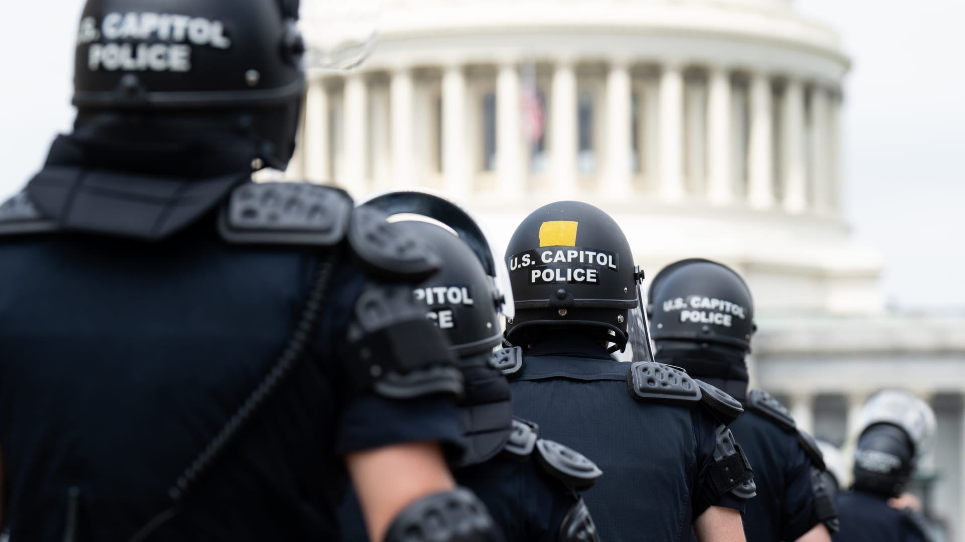 U.S. Capitol Police in riot gear return to their staging area after clear a path back to the Capitol for House Democrats after they spoke in front of the Supreme Court following the Dobbs v Jackson Womens Health Organization decision overturning Roe v Wade was handed down at the U.S. Supreme Court on Friday, June 24, 2022.