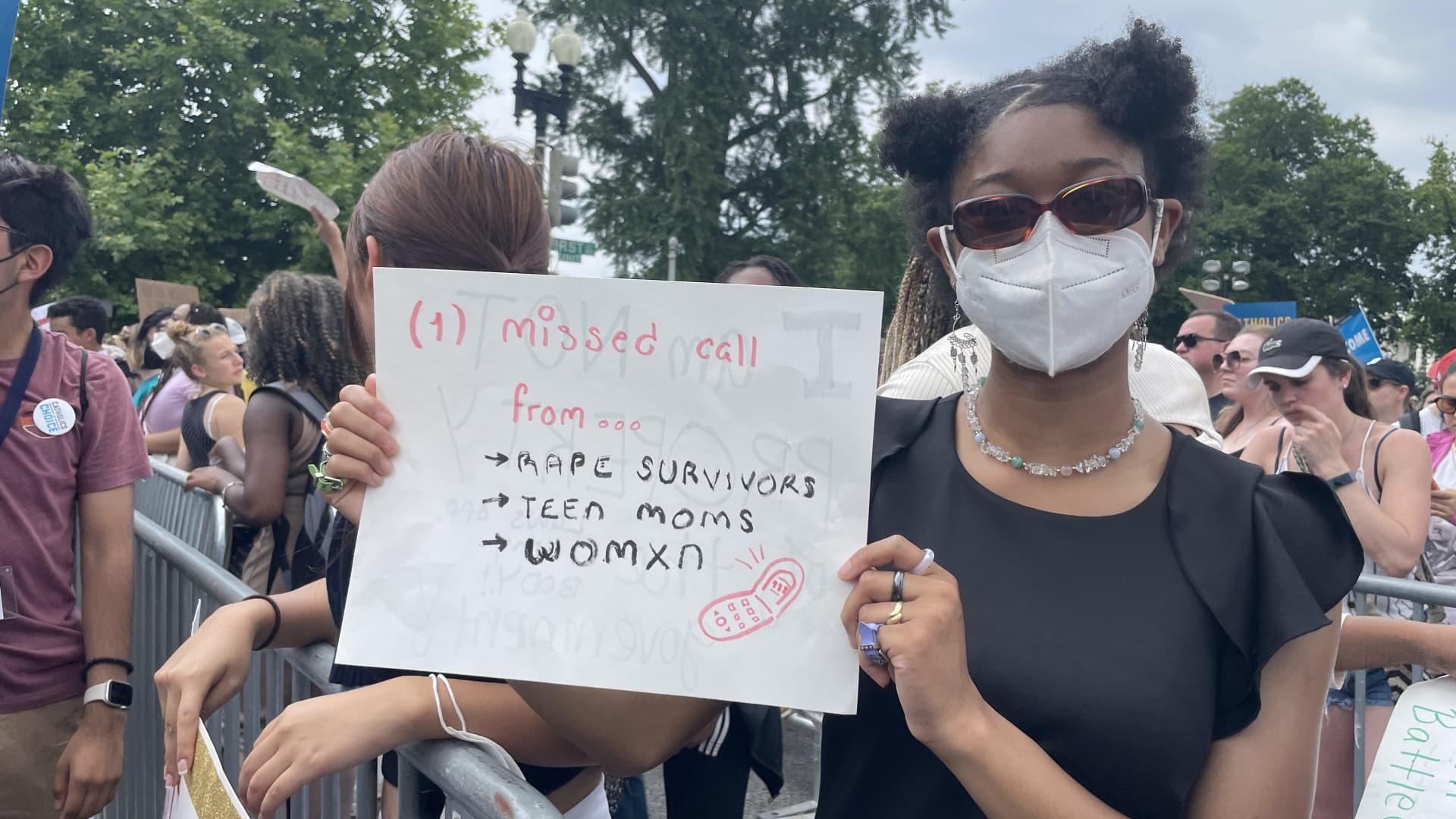 Noelle Gonzales Jackson, 15, holds a sign she made with her eyeliner during a protest outside of the Supreme Court building in Washington, D.C., on June 24, 2022.