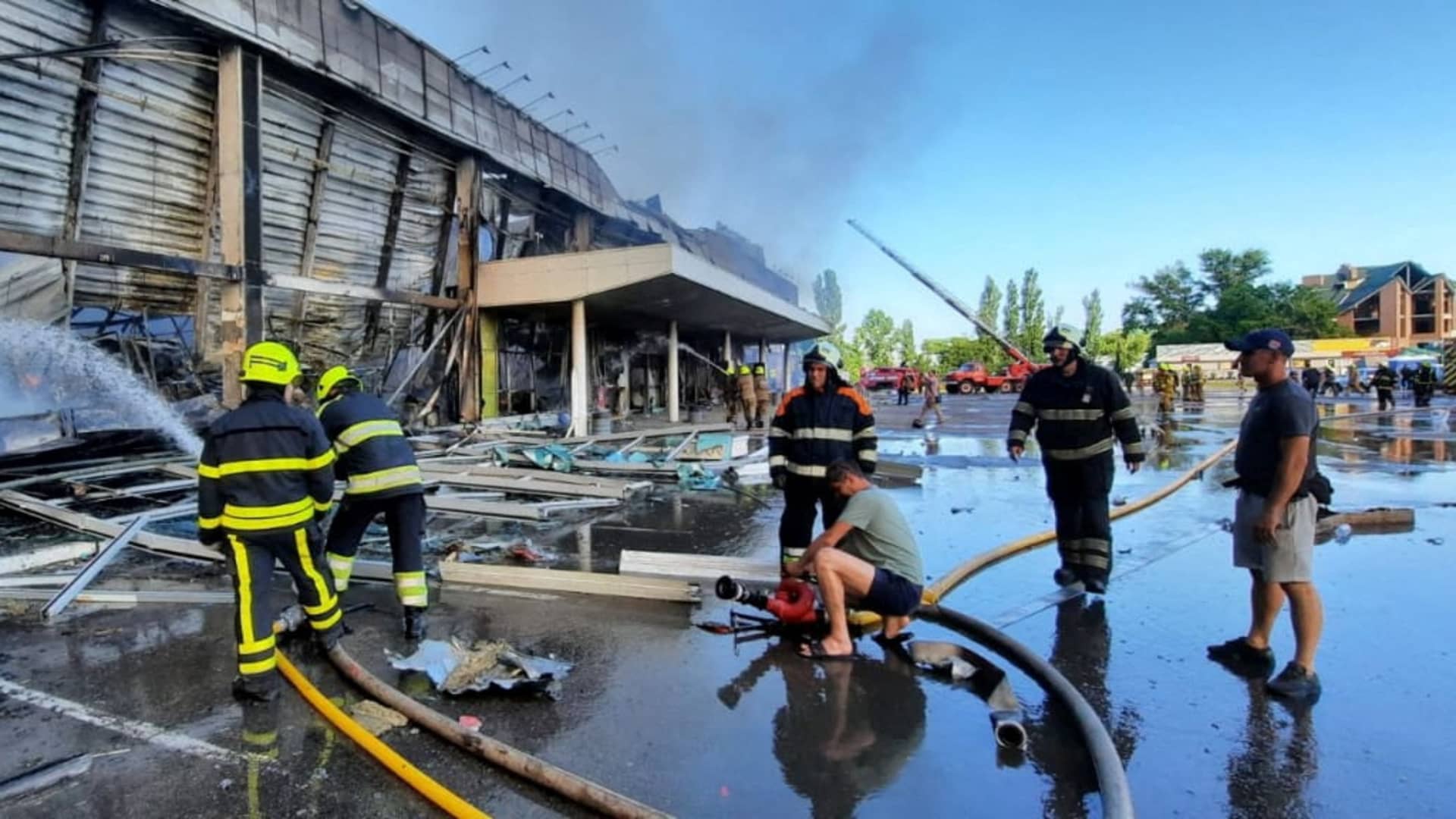 Rescue workers at the shopping mall hit by a Russian missile strike in Kremenchuk, Ukraine, on June 27, 2022. G-7 leaders denounced the strike as a war crime, while Russia has denied that it targeted a civilian building on purpose.