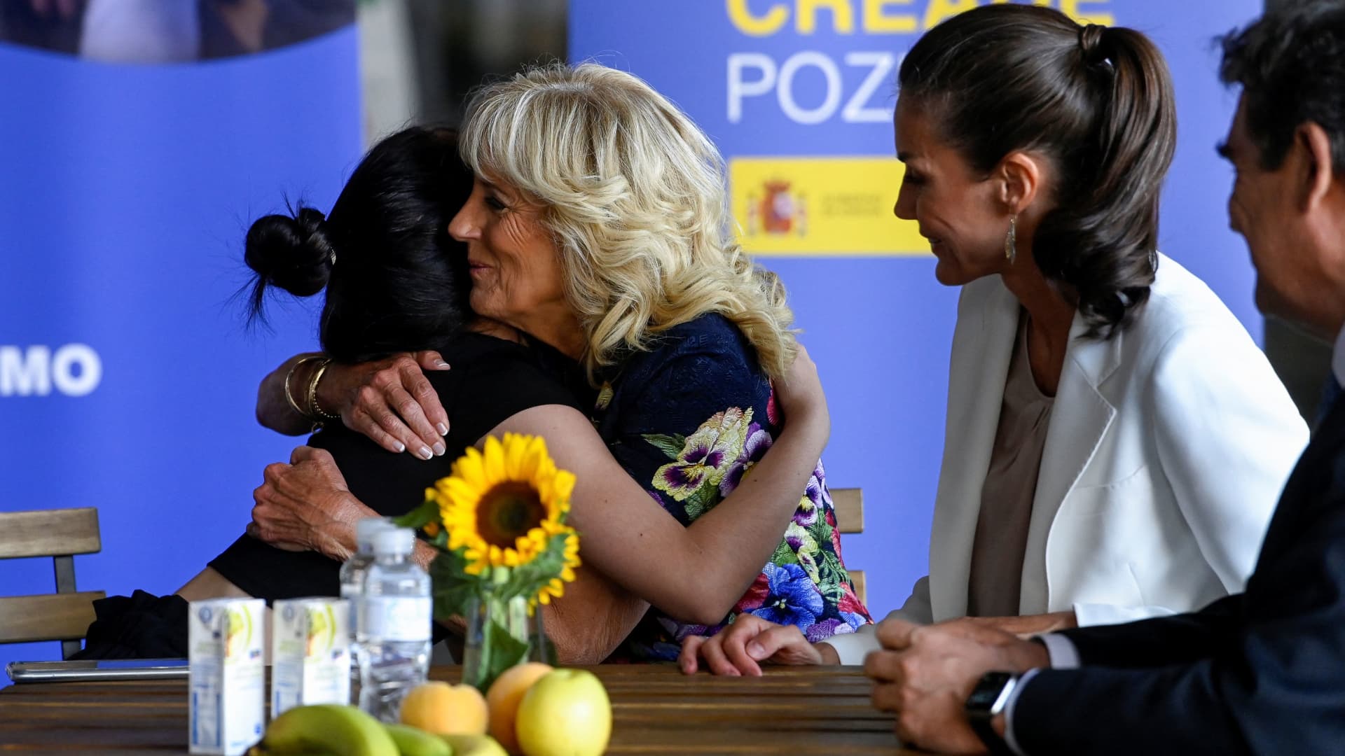 U.S. first lady Jill Biden embraces a girl next to Spain's Queen Letizia as they speak with members of a family from Ukraine during their visit to a reception centre for Ukrainian refugees in Pozuelo de Alarcon, on the sidelines of NATO summit, near Madrid, Spain, June 28, 2022.