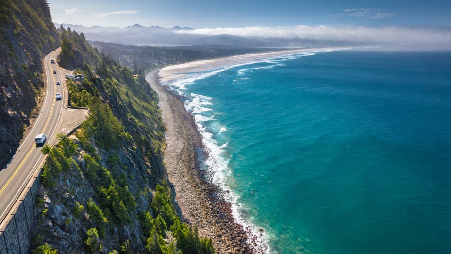Aerial view of the scenic coastline and highway 101, by the western shoulder of Neah-Kah-Nie mountain, in Oregon, United States.