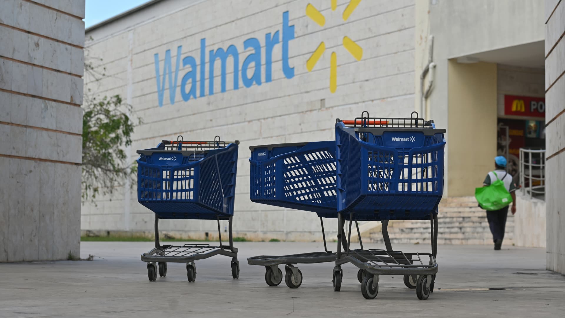 Walmart shares stoop after retailer cuts revenue outlook on inflation considerations