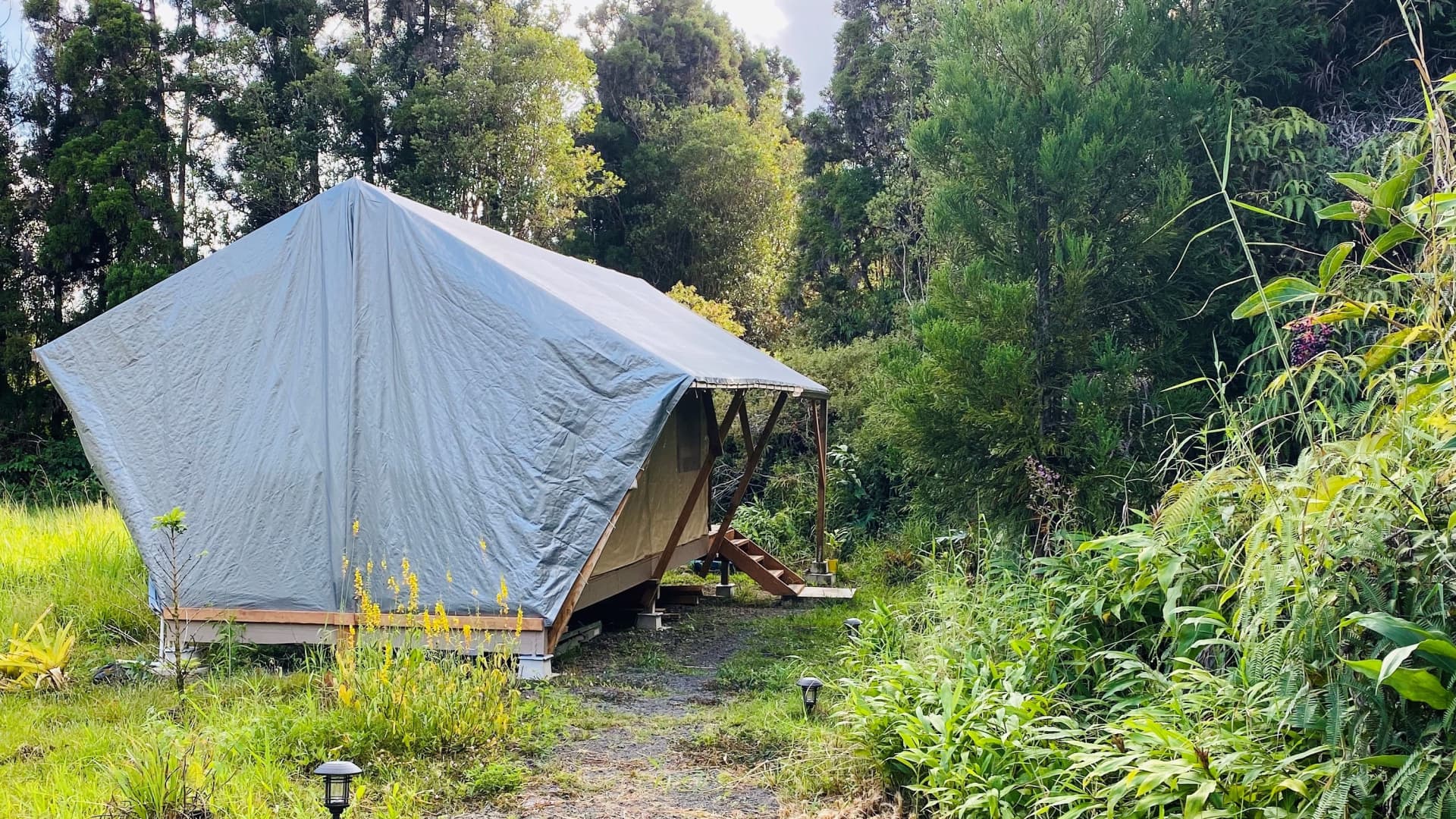 Hall's tucked away glamping tent costs roughly $70 per night and is about 12 miles away from the heart of Hawaii Volcanoes National Park.