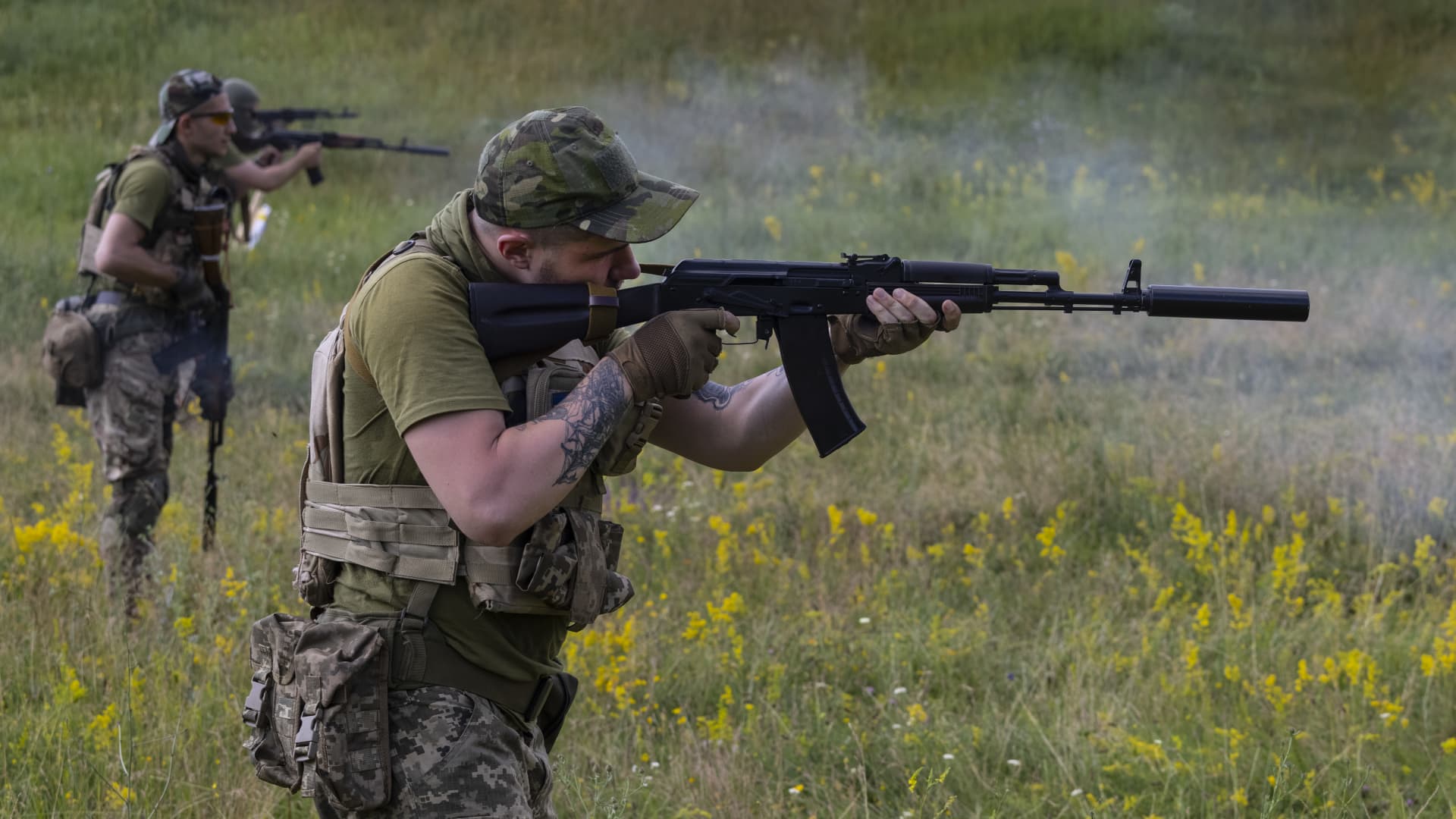 Azov Regiment soldiers fire weapons during target practice on June 28, 2022 in the Kharkiv region, Ukraine. The U.K. will provide another 1 billion pounds ($1.2 billion) of military support to Ukraine, Reuters said citing the British government.