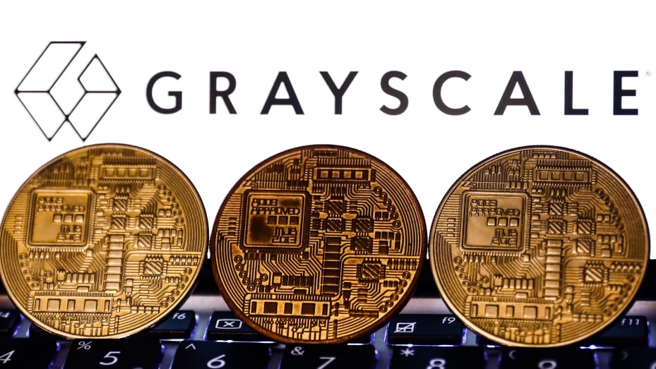 Representation of cryptocurrency and Gayscale logo displayed on a phone screen are seen in this illustration photo taken in Poland on November 6, 2021. (Photo by Jakub Porzycki/NurPhoto via Getty Images)