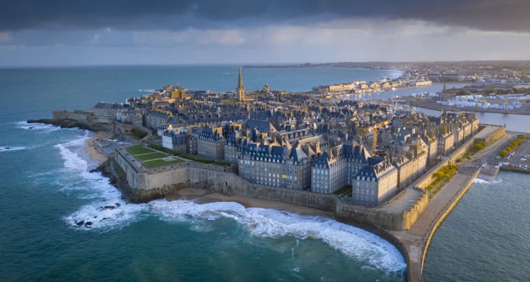 With fewer foreign travelers during the pandemic, smaller towns and villages in France emerged as popular vacation spots with locals, such as Saint-Malo in the region of Brittany.